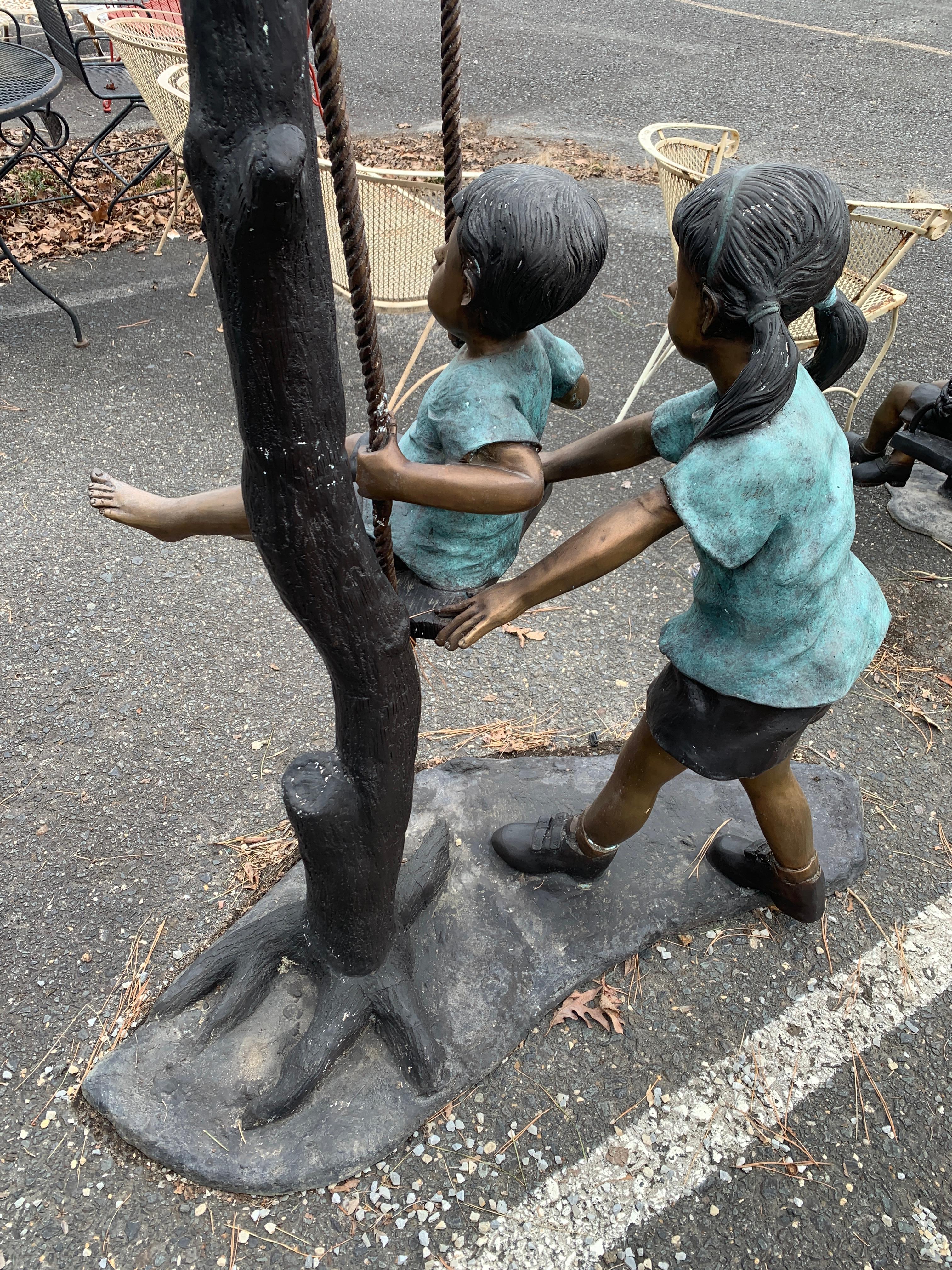 Bronze Statue of Children on Swing 1