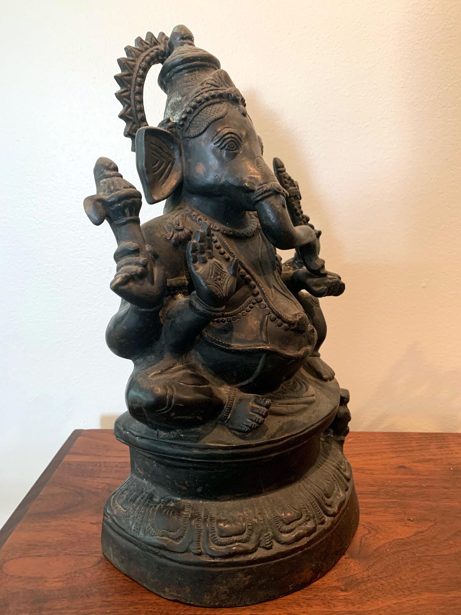 A heavily cast statue of Ganesh from early 20th century collected in Kandy, Sri Lanka. The semi-elephant semi-human deity is also known as Ganesha, Ganapati and Vinayaka. In the Hinduism, Ganesh has the statues of the most popularly worshiped god in