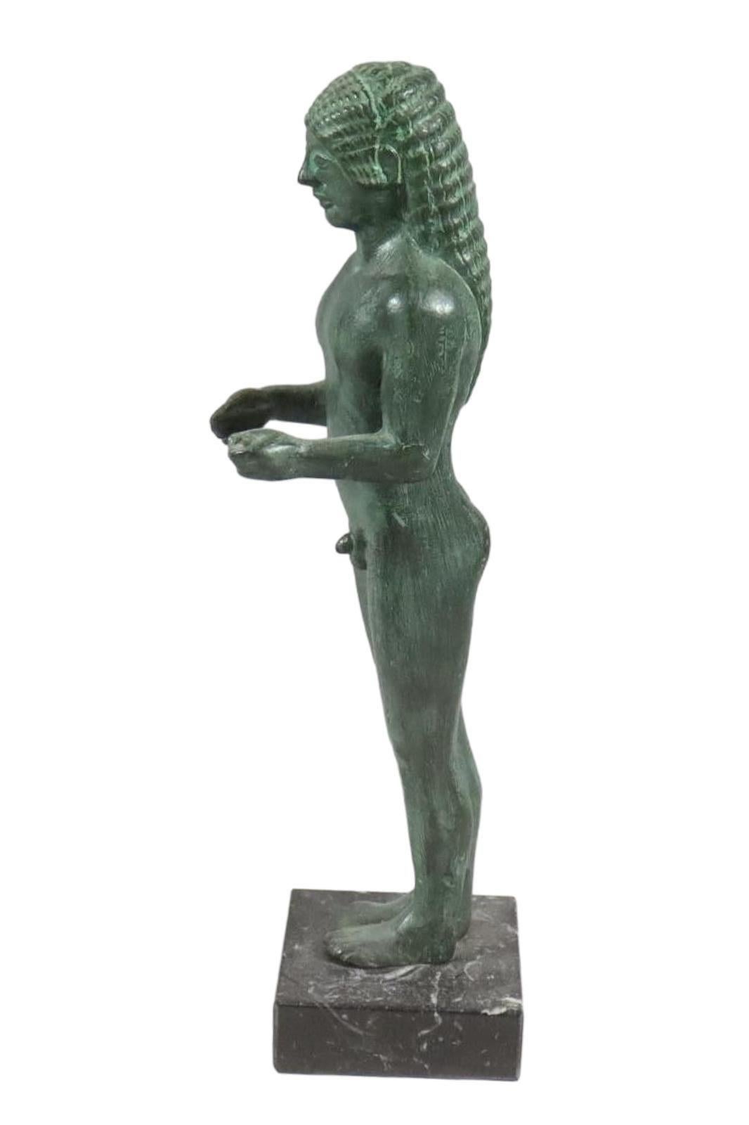 Offered is a Mid-Century Modern Greek patinated sculpture. This Etruscan Greek Statue is an iconic Mid-Century Modern item of decor. It would look fabulous on a console table, in a book shelf, center table, étagère and so many other decorative areas