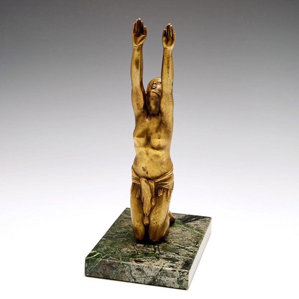 Bronze Statuette of Female Native American Figure in Adoration, Early 20th century

Additional information:
Date : Early 20th century
Origin : European
Decoration : A kneeling female figure raises her arms in adoration or praise, wearing only a