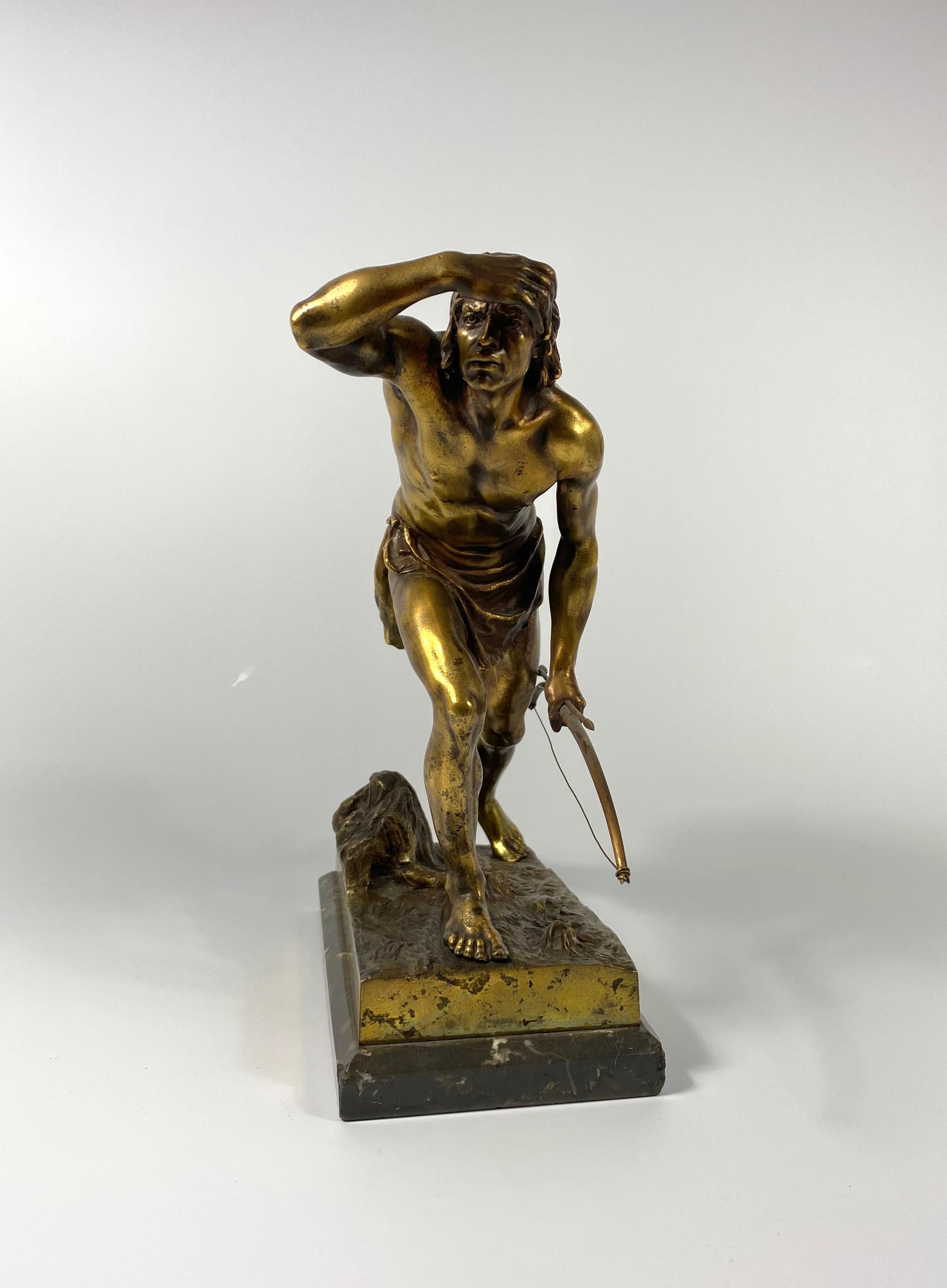 Josef Drischler (1838-1917). A fine gilt bronze study of a Native American Brave, with his right hand raised to screen the Sun, whilst he stalks his prey. He holds his bow and arrow in his left hand, whilst he moves, bare footed, over a grassy mound