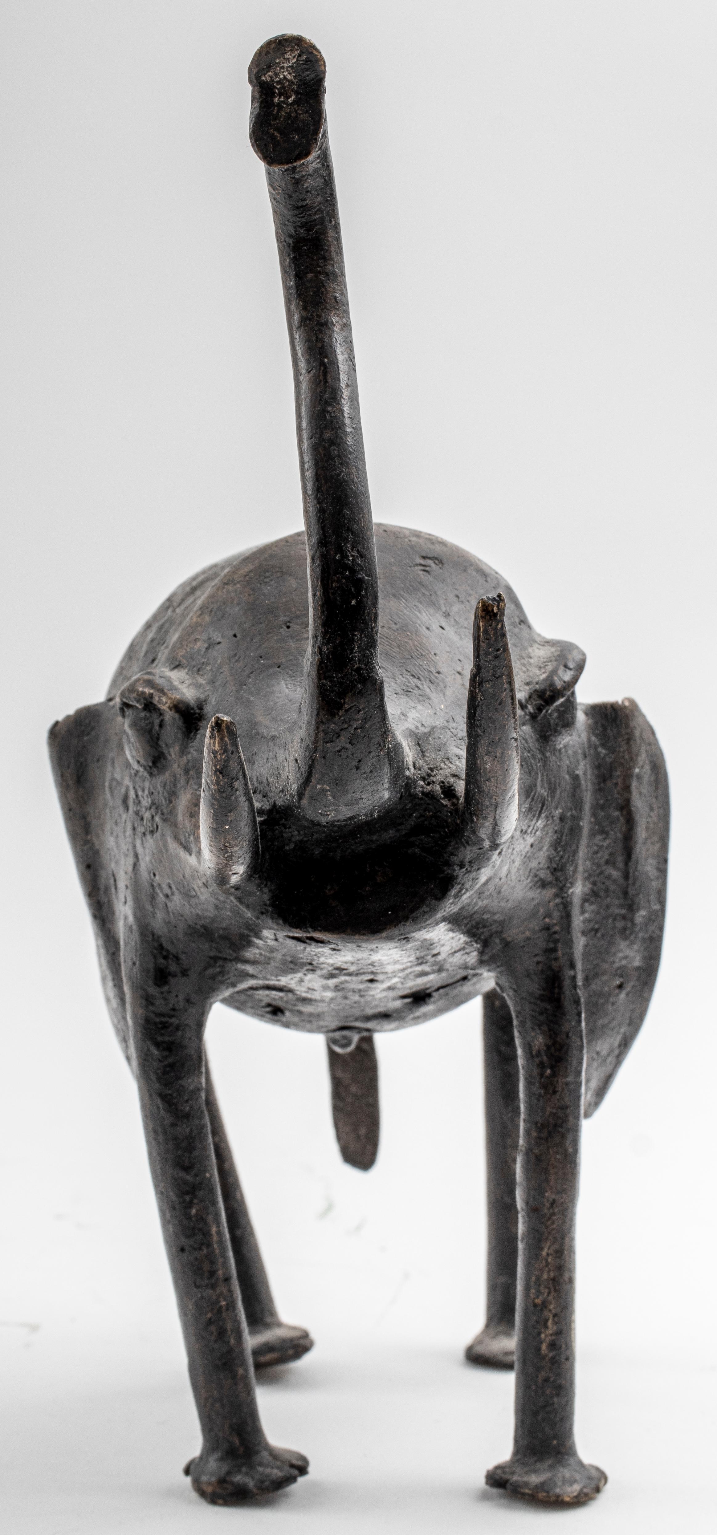 Bronze stylized elephant sculpture, unmarked. 

Measurements: 8.75