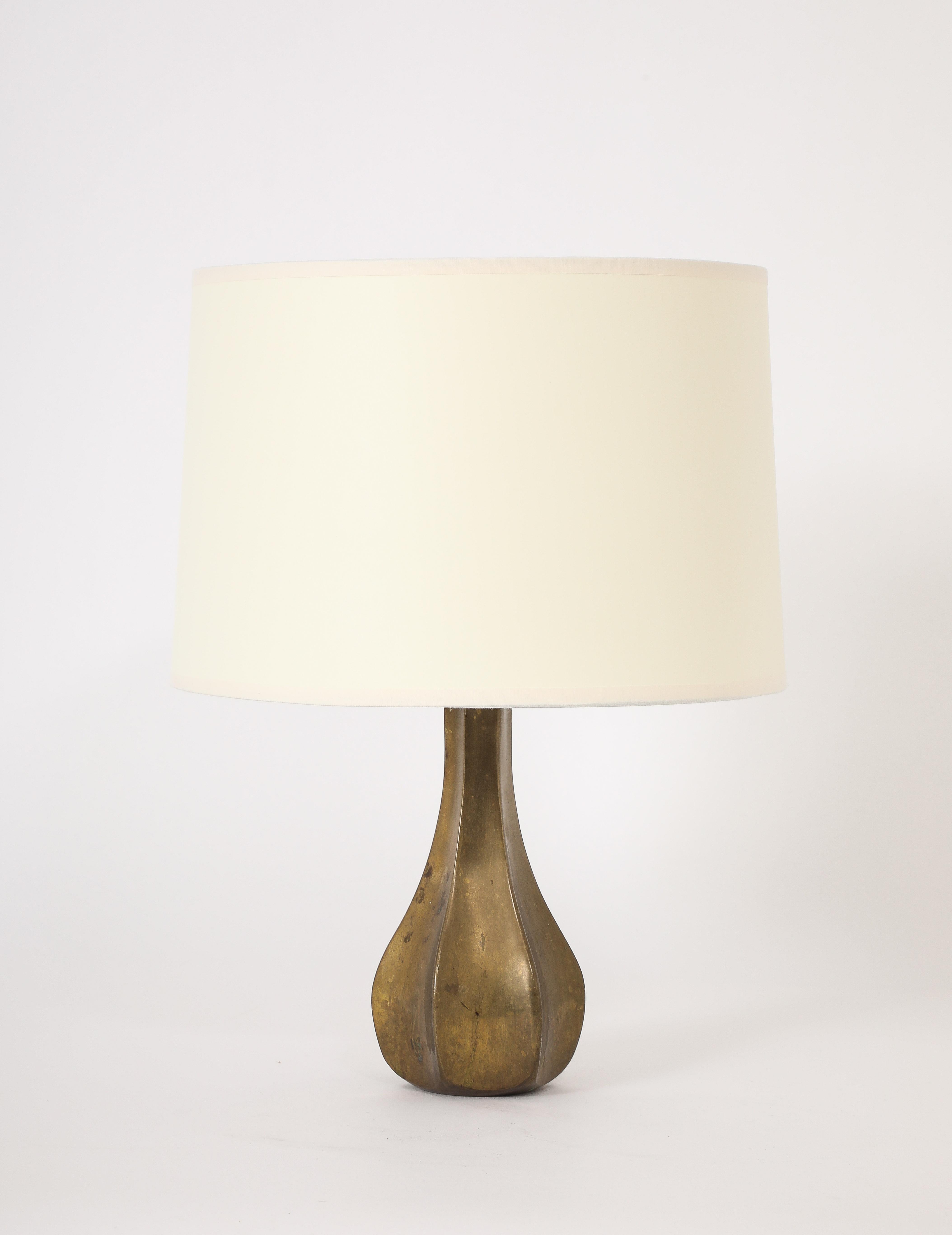 A flutter brass table lamp in the shape of a gourd.

22x12
Base Only 12x4