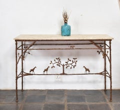 Mesa de bronce con tema africano