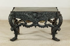 Bronze Table with Sculpted Lion Heads, Paw Feet, and Ornate Foliage Detailing
