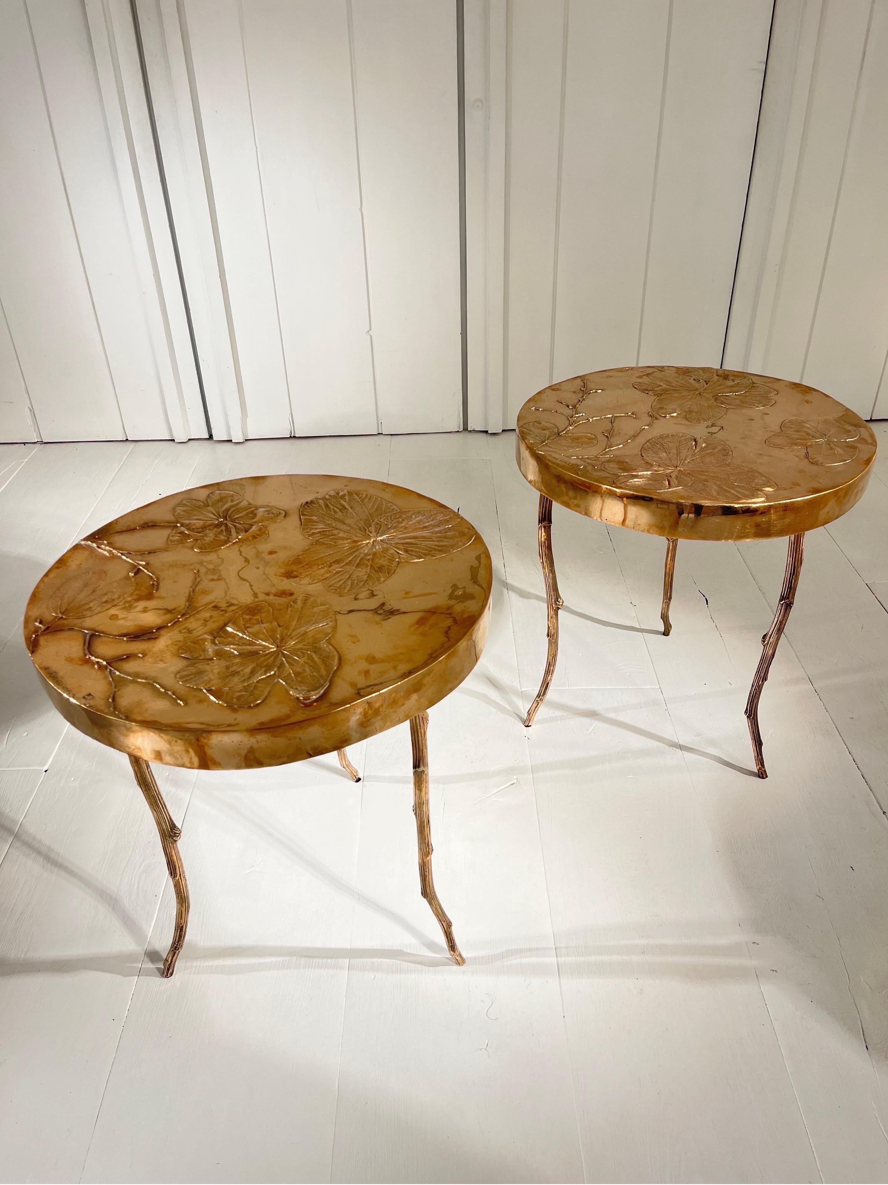 Pair of side tables in bronze  by Clotilde Ancarani
tripode feet and ginko leafs drawings  on the top 
one tanle in stanped and signed 1/1
second table stanped and mark 1/8
perfect condition
