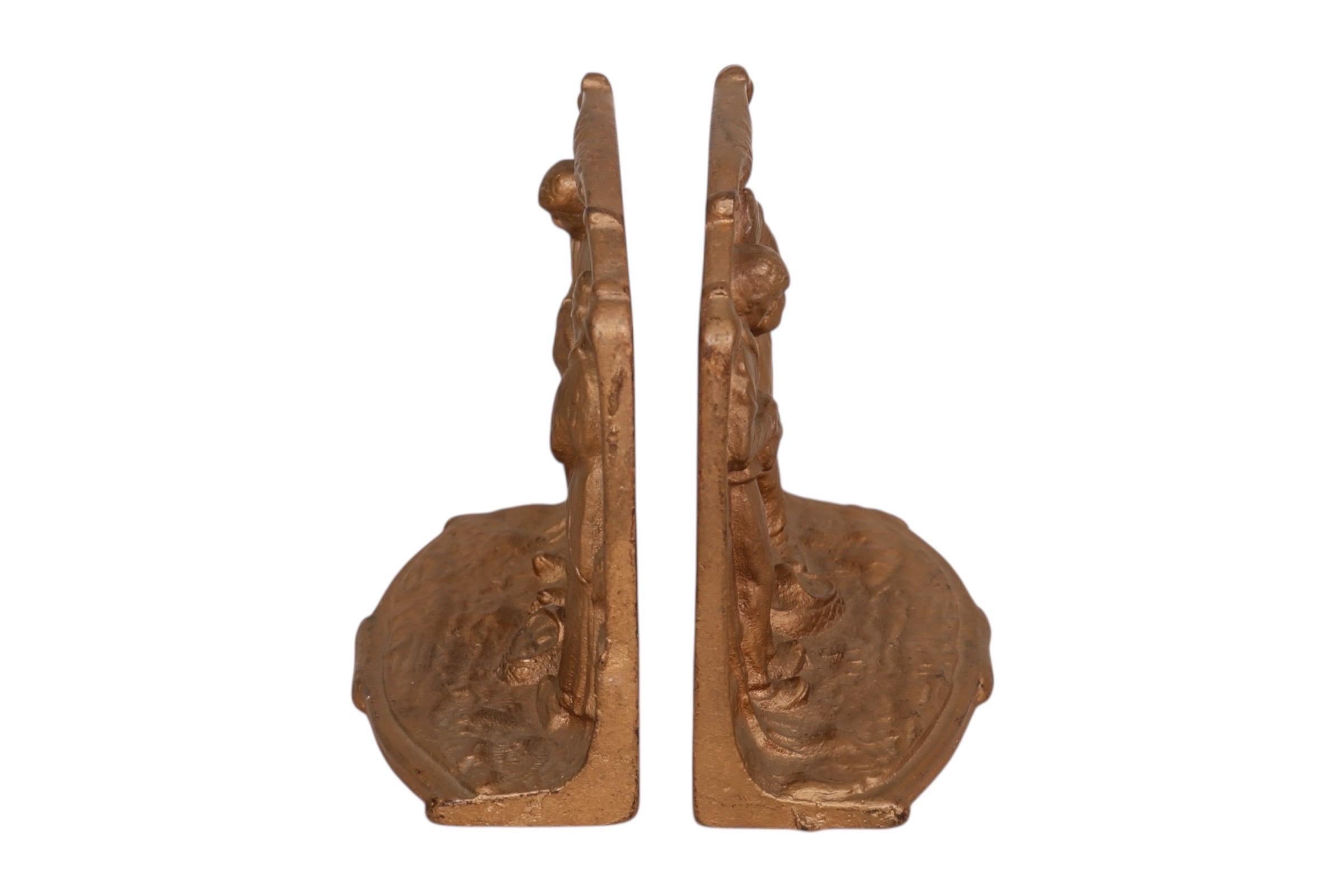 Paire de serre-livres en bronze 