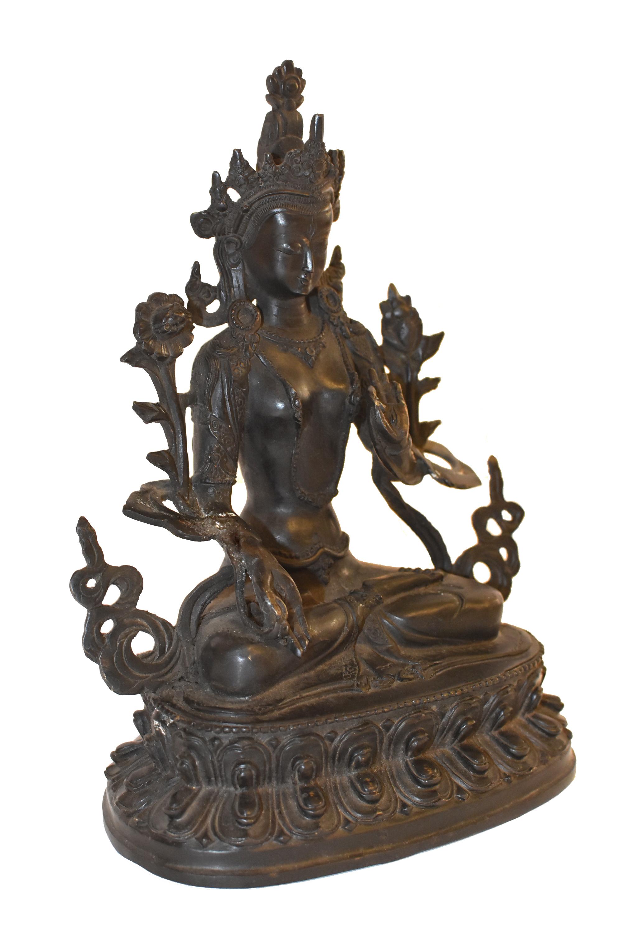 The Tibetan White Tara is regarded as consort of Avalokiteswara. Seated in vajrasana on a lotiform base, holding a lotus stem in her left hand, her right hand in jnana mudra, gesture of teaching. She has an extra eye on her forehead, palm and feet