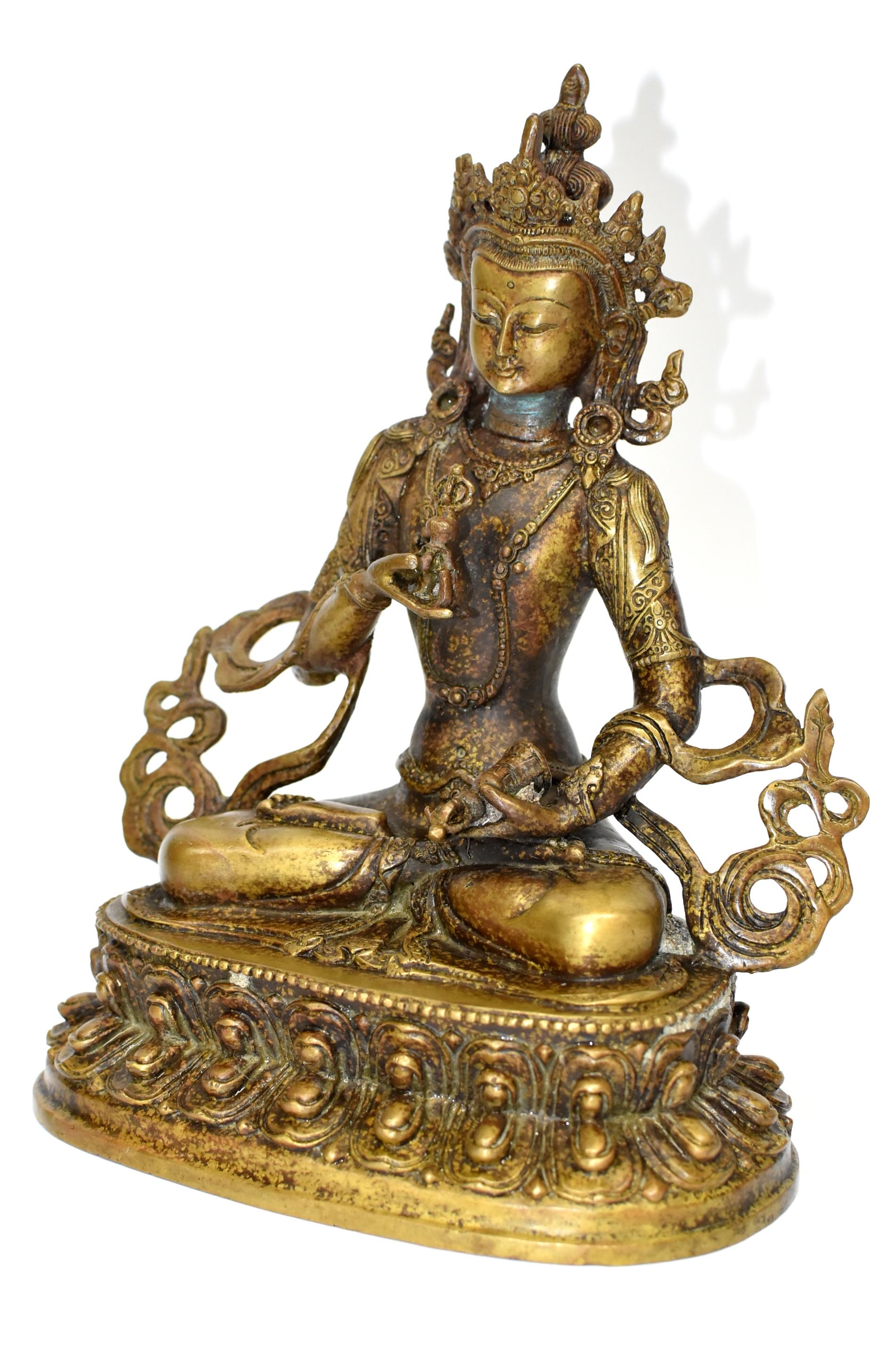 A beautiful statue of Tibetan Bodhisattva Vajrassatva in antique mottled gold finish. The Vajrassatva is an deity that focuses on purification of bad karma.  Meditation upon Vajrassatva is integral to enlightenment as it manifests in one's