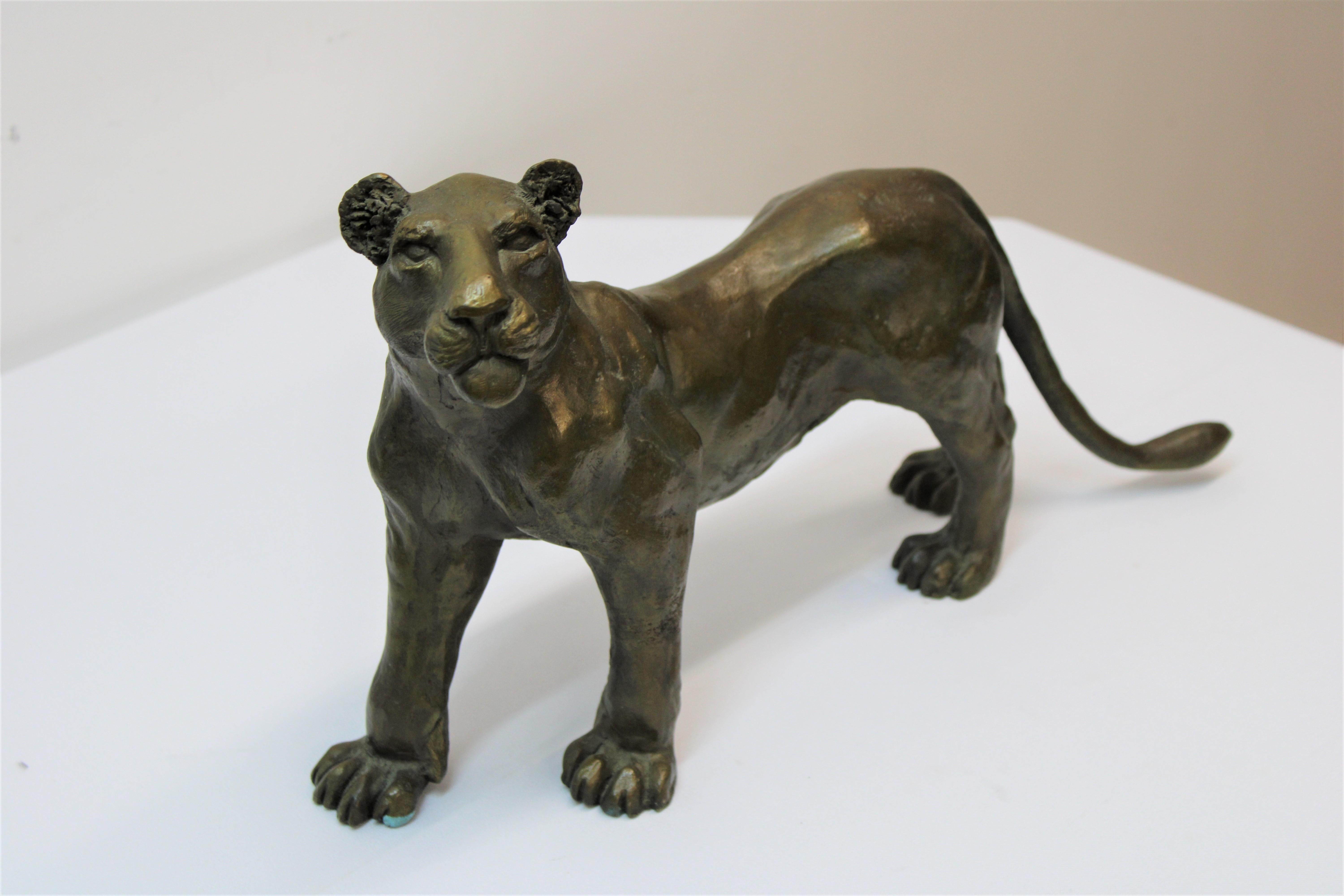 C. 20th Century

Bronze Tiger By Sue Rifenberick.
