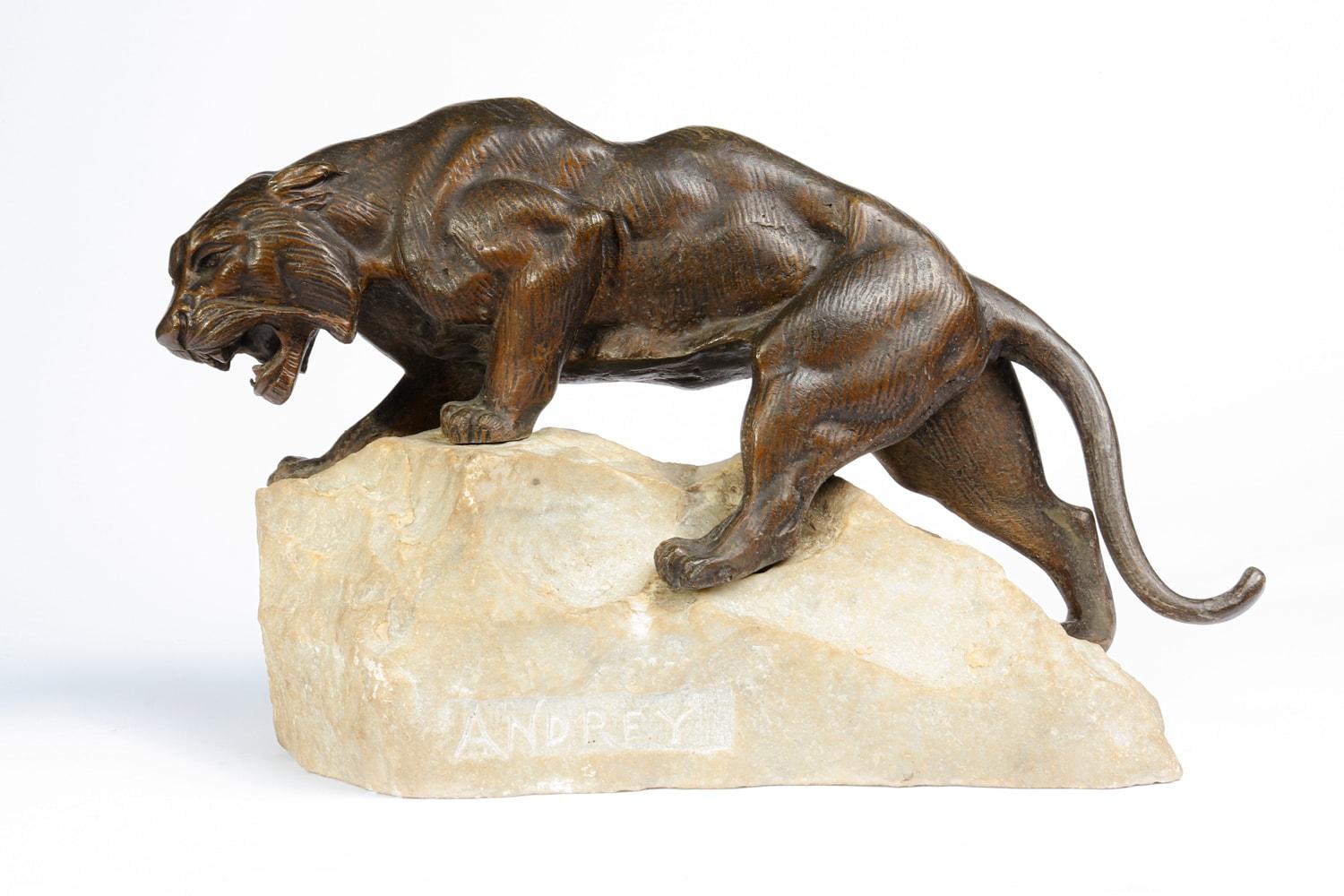 Bronze Tiger on a rock by James Andrey – France circa 1920

A cast bronze Tiger by James Andrey produced in the 1920s in France, this Tiger has been fitted to a rough cut marble base with Andrey inscribed

Age: 1920

Style: bronze