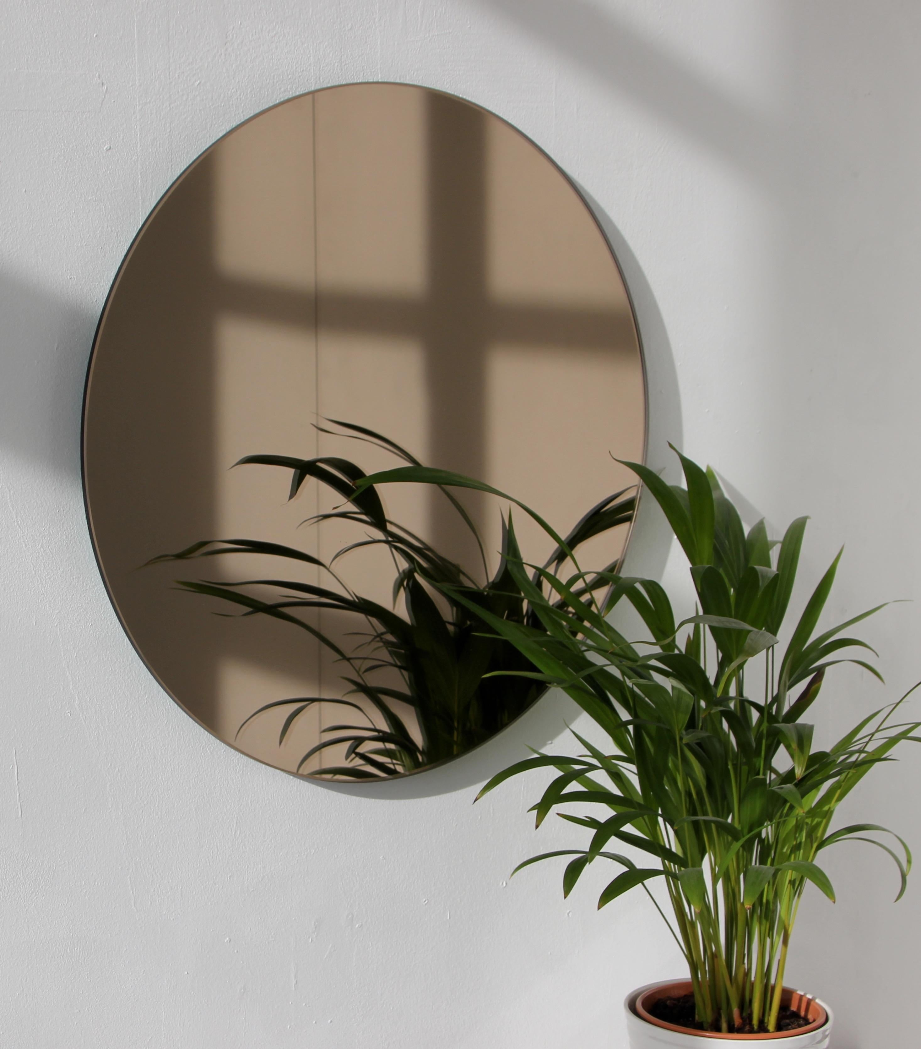 Modern Orbis Bronze Tinted Round Minimalist Frameless Mirror Floating Effect, Regular For Sale