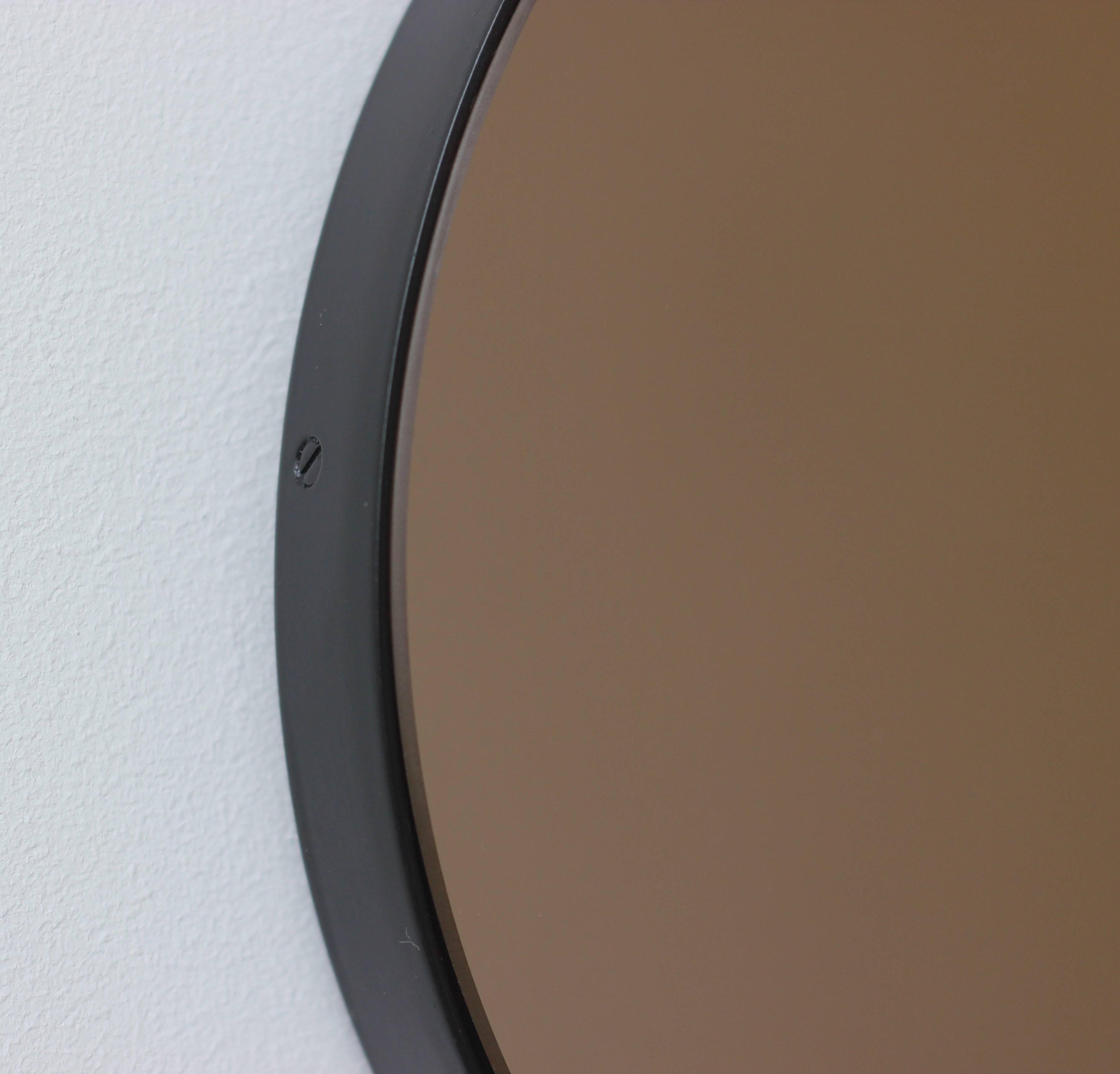British Orbis Bronze Tinted Modern Handcrafted Round Mirror with Black Frame, Regular For Sale