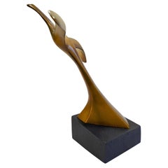 Eight Inch Tall Bronze-Toned Bird Sculpture on Black Base