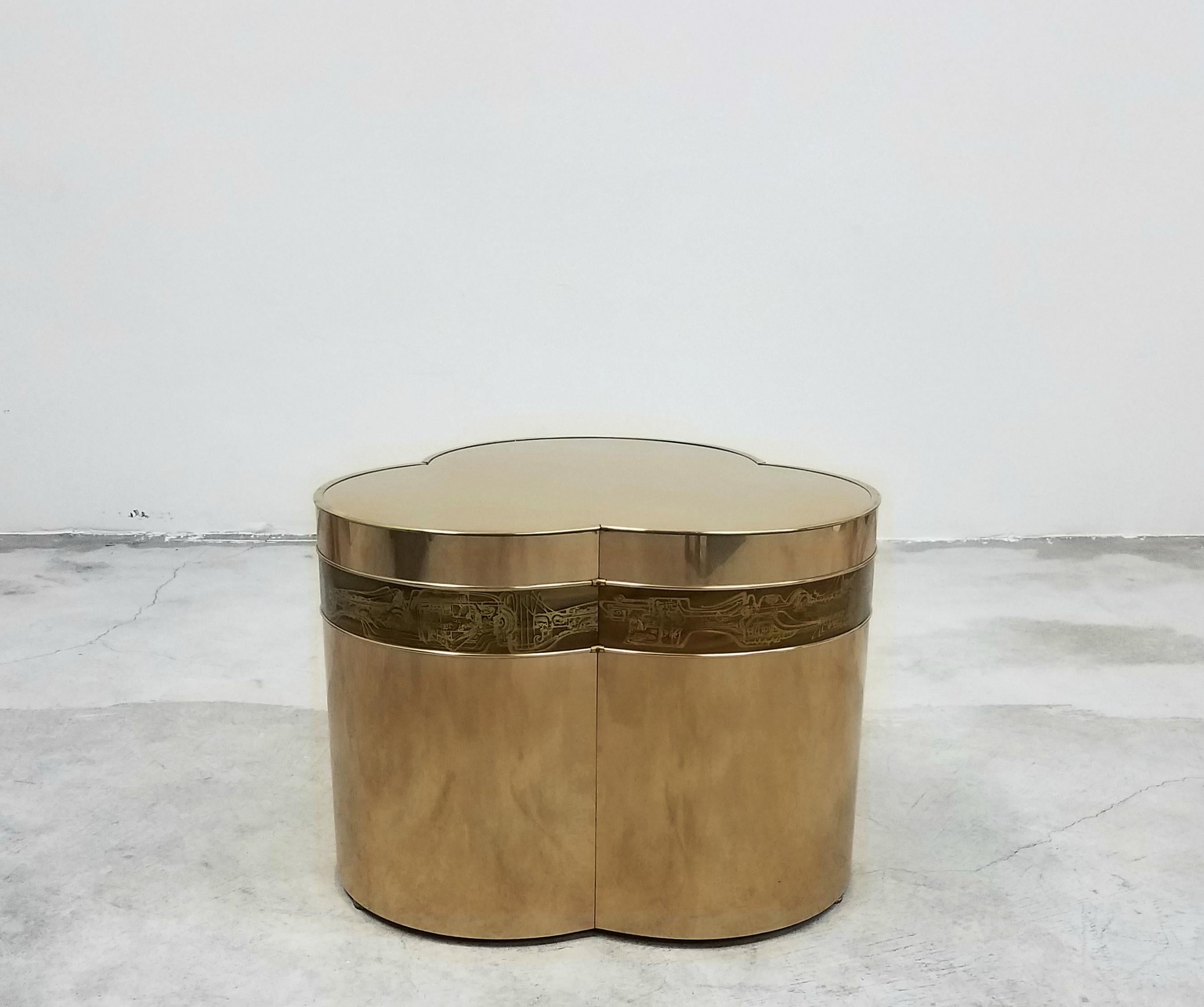 A beautiful trefoil shaped bronze side table with acid etched details characteristic of Bernhard Rohne pieces. A unique and rare piece.

Makes a beautiful side table but is substantial enough to be used as a coffee table, just add glass.