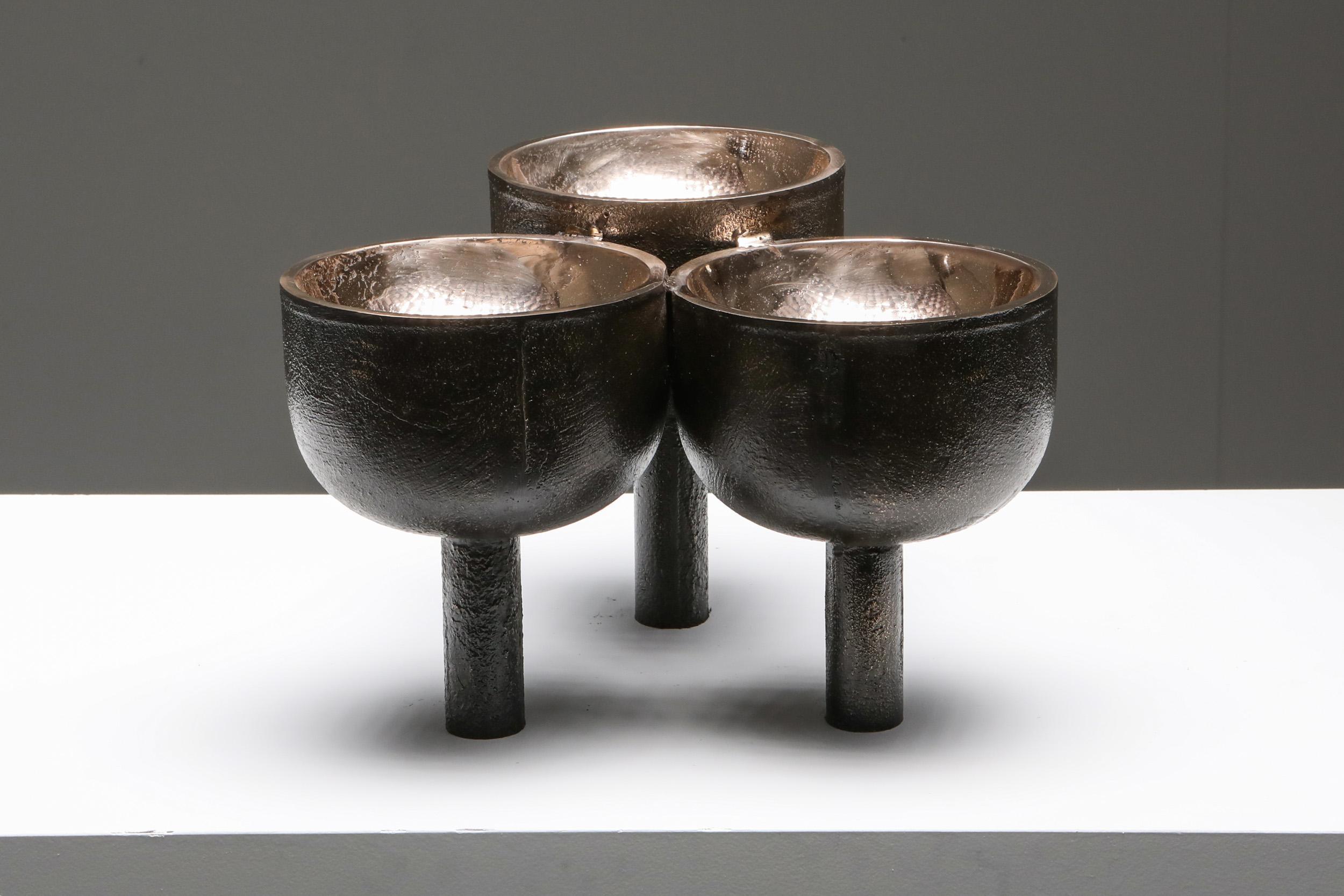 Bronze triple tray by Arno Declercq
Materials: pink bronze
Measures: W30 x D 28 x H 19 cm


Arno Declercq
Belgian designer and art dealer who makes bespoke objects with passion for design, atmosphere, history and craft. Arno grew up in a