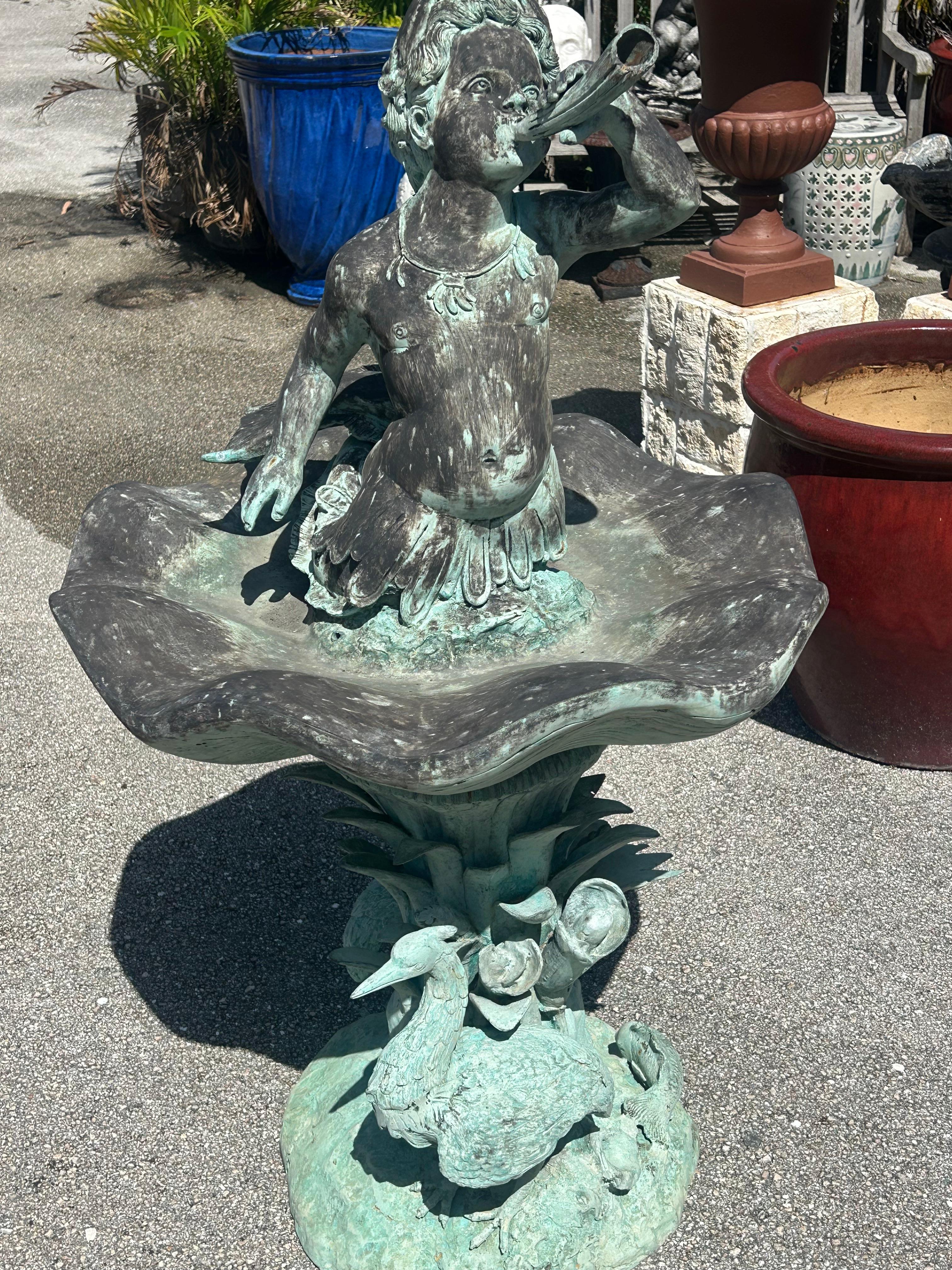 Fuente Tritón de bronce siglo XX en venta