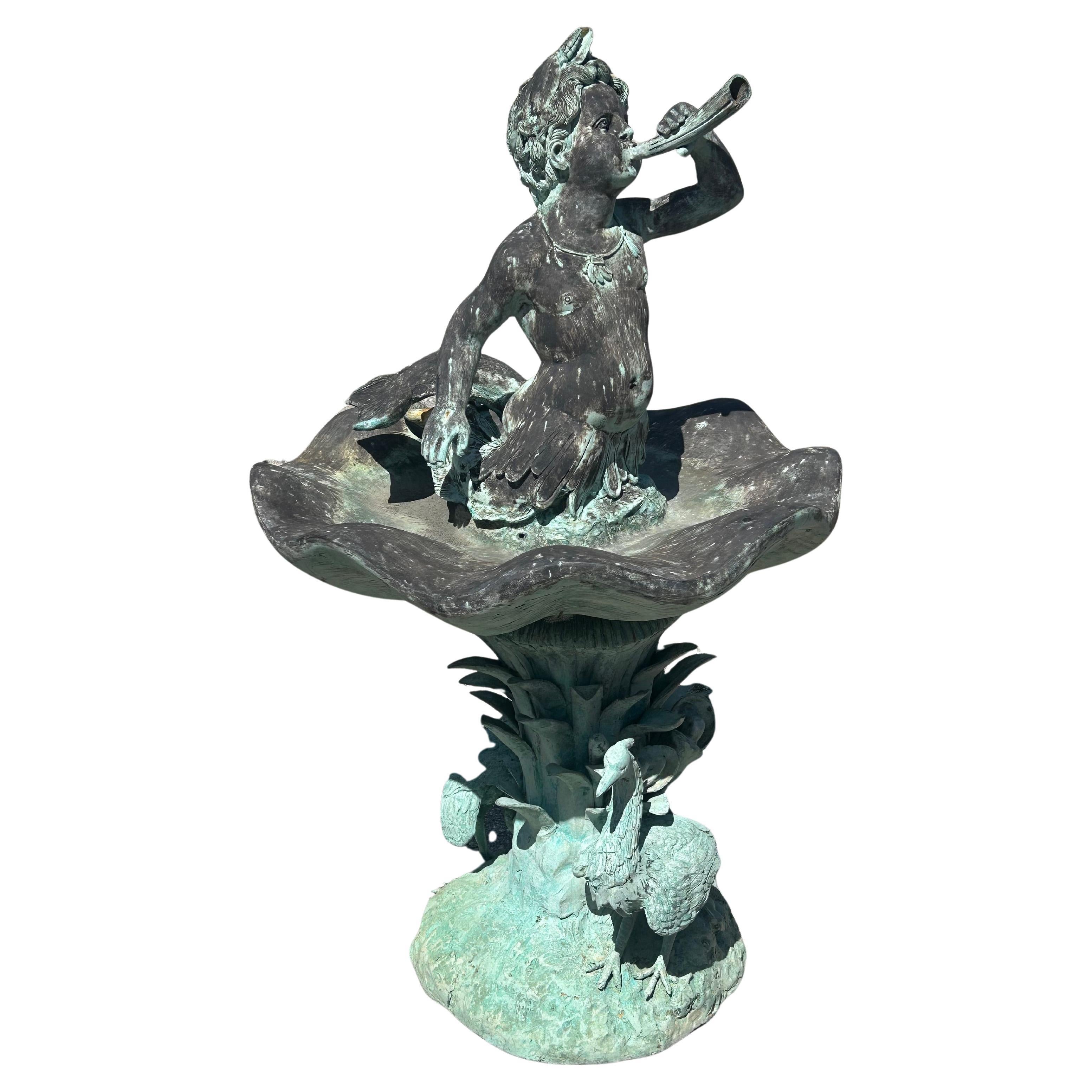 Fuente Tritón de bronce