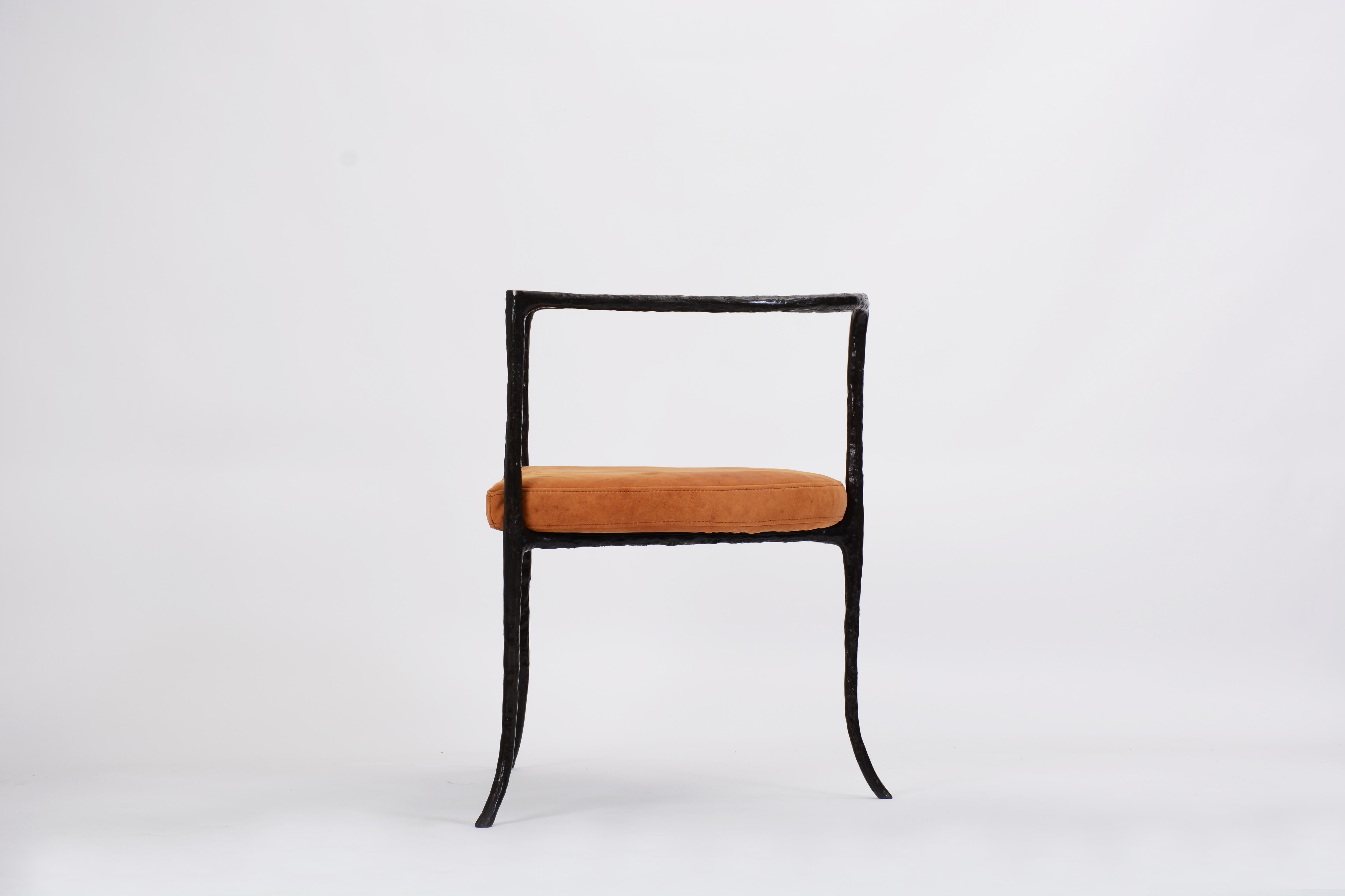 Made to order Twig Side Chair / Armchair in Cast Bronze with Leather Seat Cushion by Elan Atelier.

Inspired by Giacometti, the twig chair is a sculptural form cast in solid bronze with a leather seat cushion. 

Dimensions/
w 22.5 x d 21.8 x h 27.5