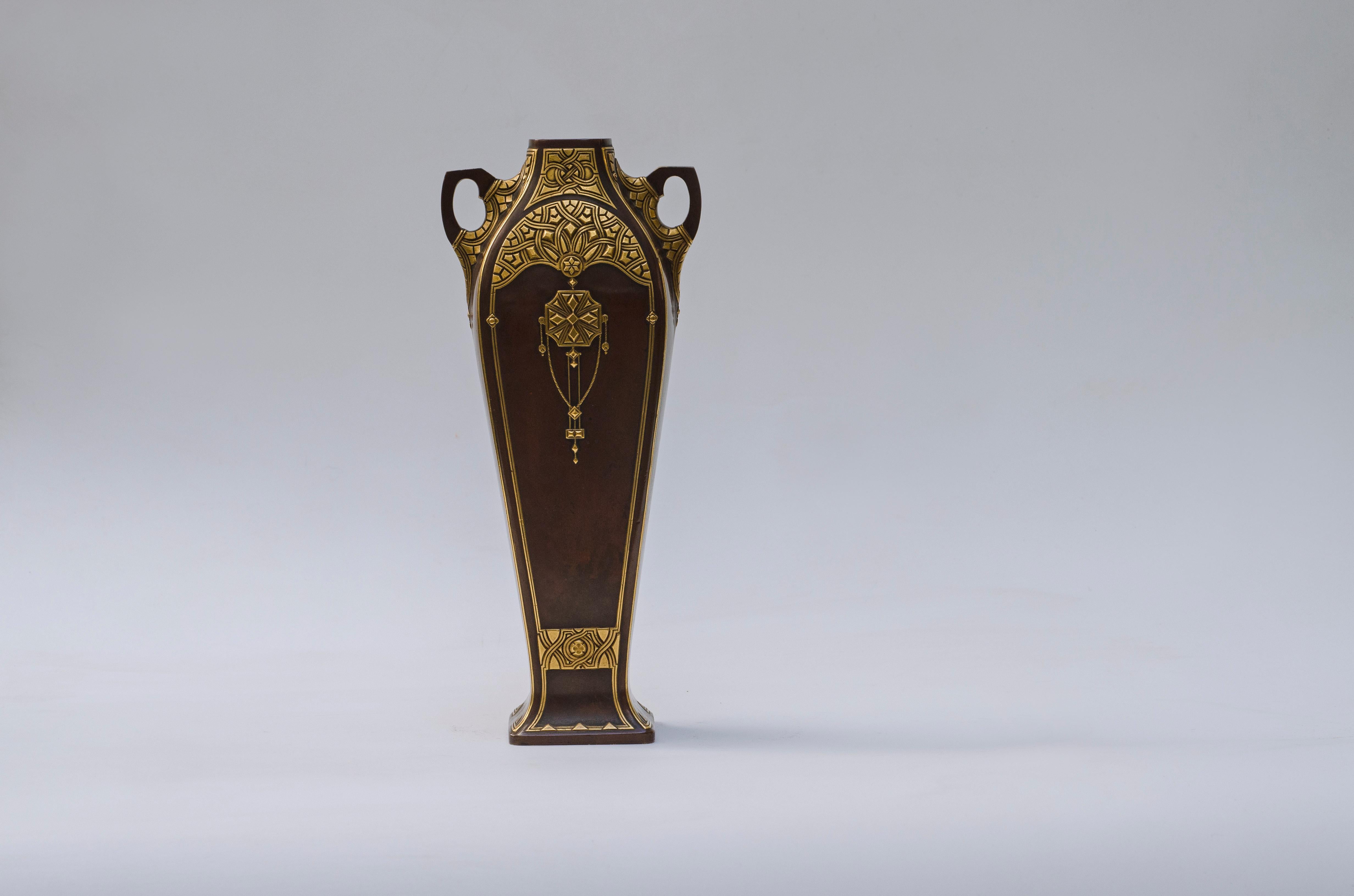 Bronze vase by Christofle. Brown patina and golden details.

Argus Valentine's (2003) 