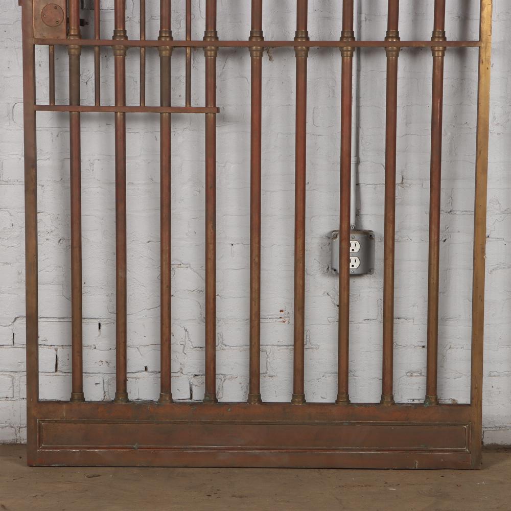 Bronze vault door and a pair of matching panels C 1910. In Good Condition For Sale In Philadelphia, PA