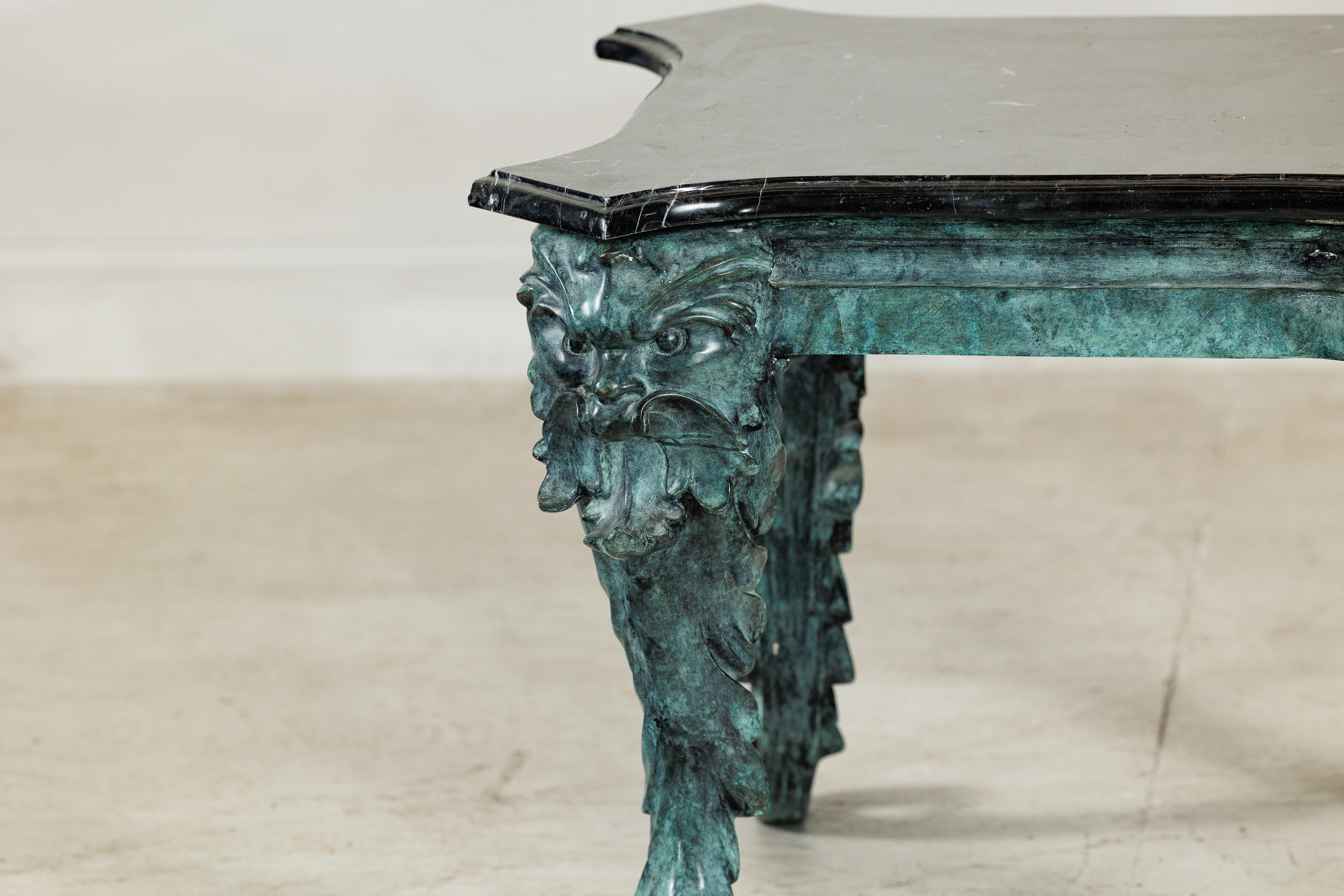 Bronze Verdigris Table with Black Marble Top and Sculptural Mask Legs Bon état - En vente à Yonkers, NY