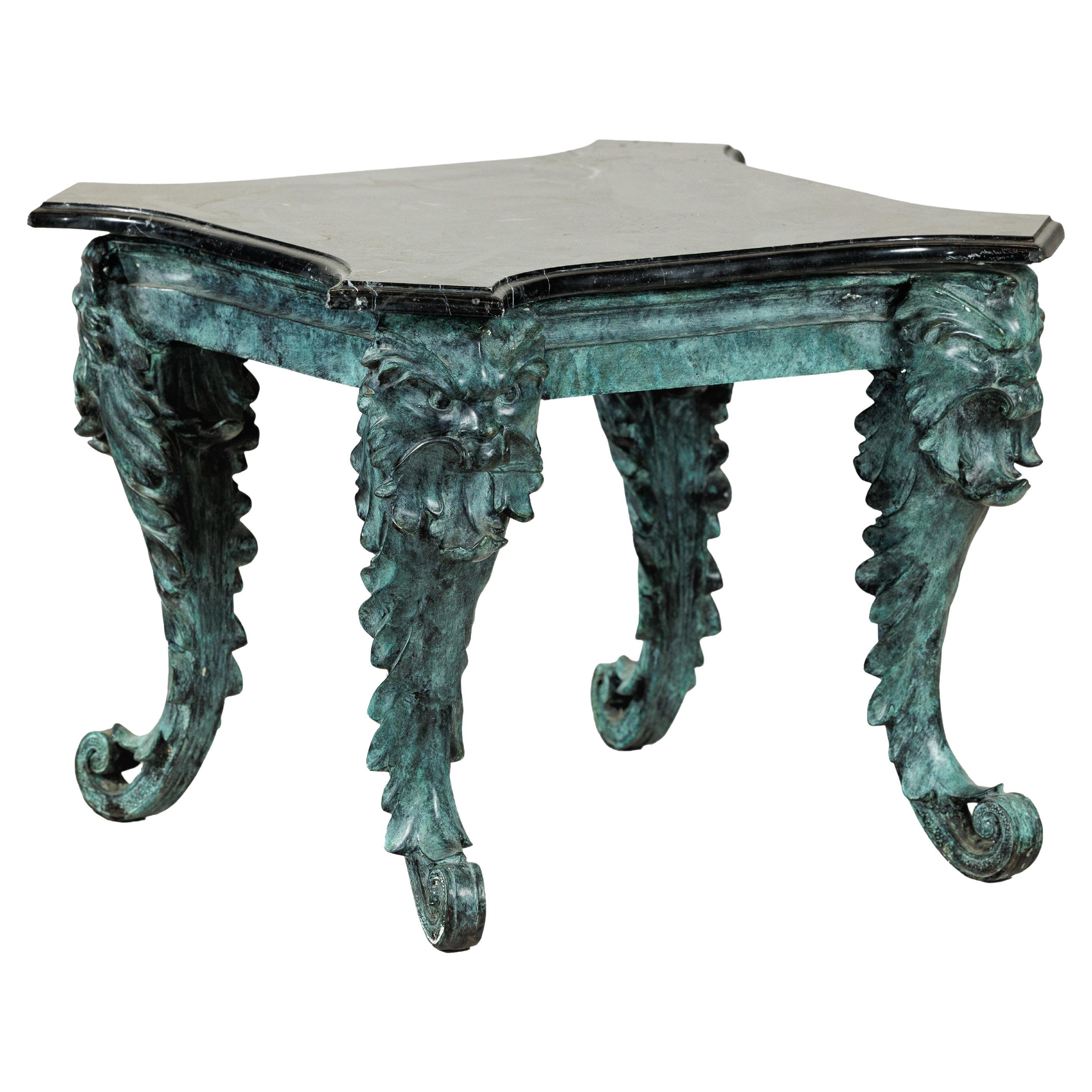 Bronze Verdigris Table with Black Marble Top and Sculptural Mask Legs en vente