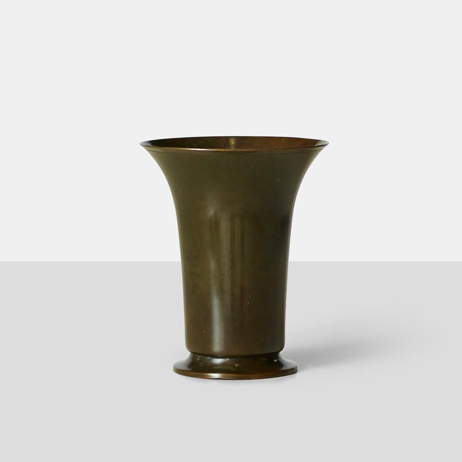 A bronze vessel with a flared rim by Just Andersen, made for his eponymous company, model #LB 1596. Terrific patina.