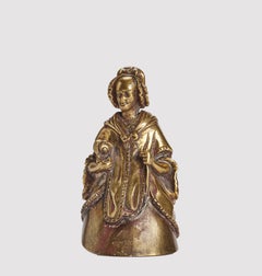Bronze vintage table bell, depicting an old women with a dog, London, UK 1880.