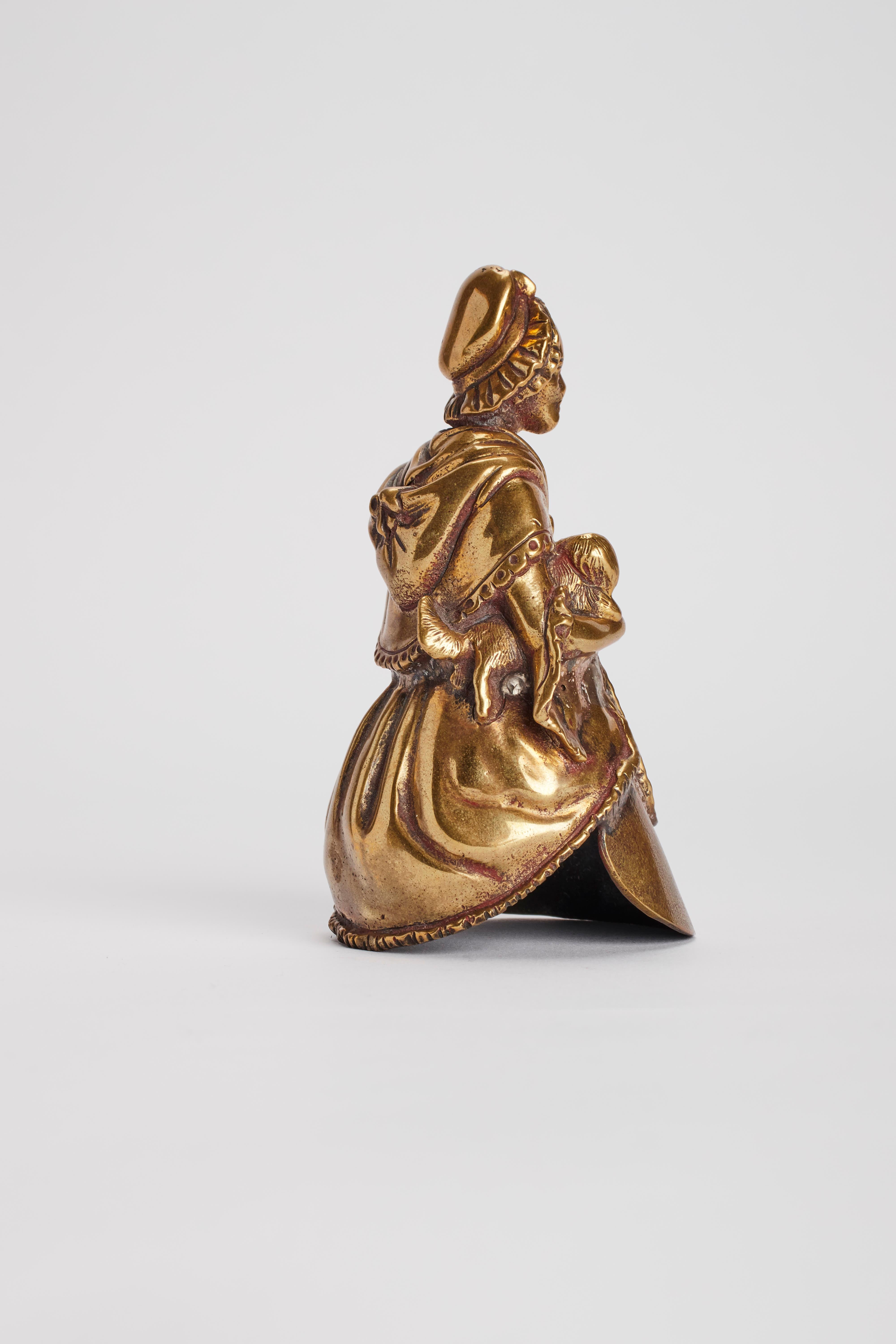 XIX secolo Campana da tavolo vintage in bronzo, raffigurante una donna anziana con un cane, Londra, Regno Unito 1880. in vendita
