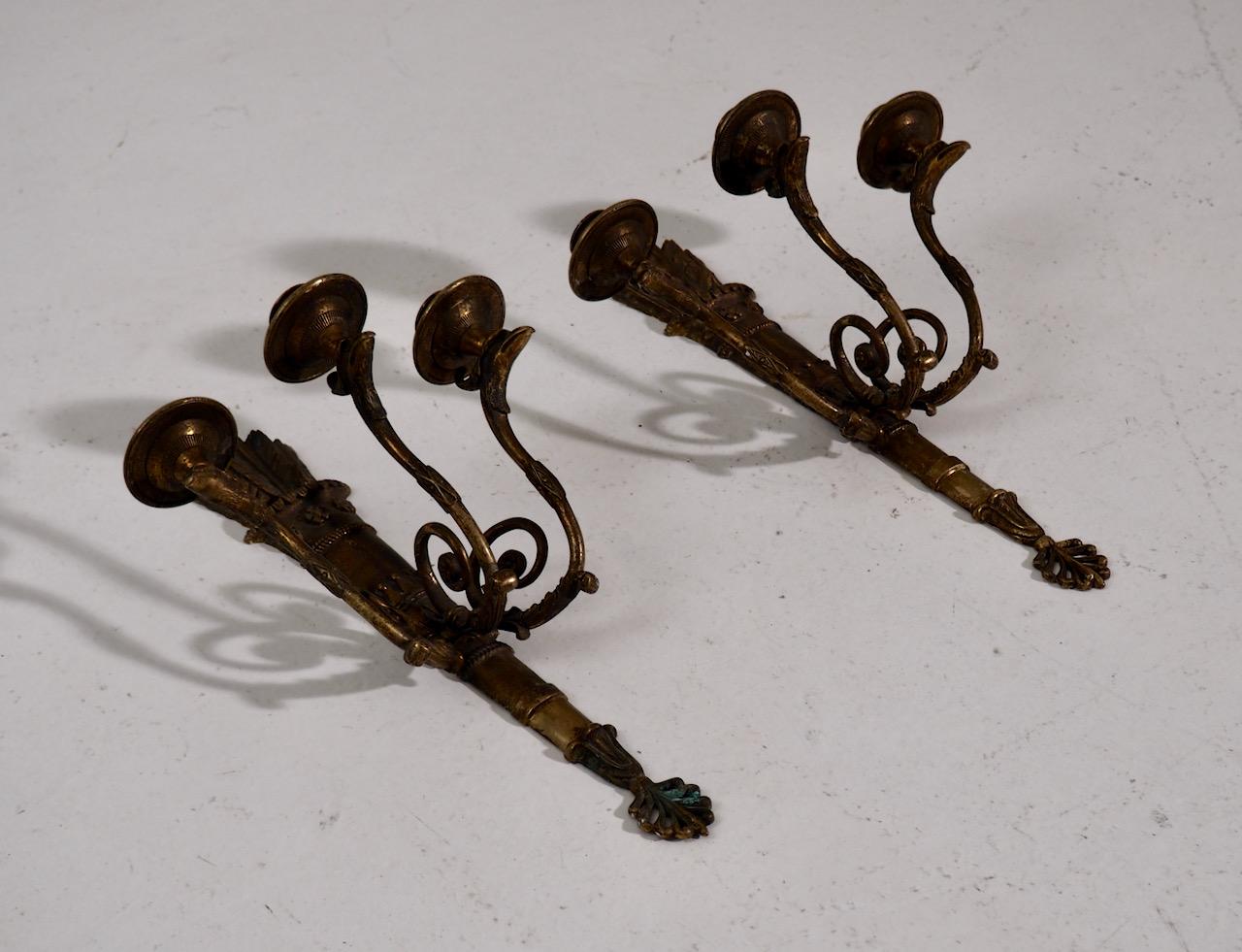 Charming bronze wall lamps, probably from France, circa 100 years old.
