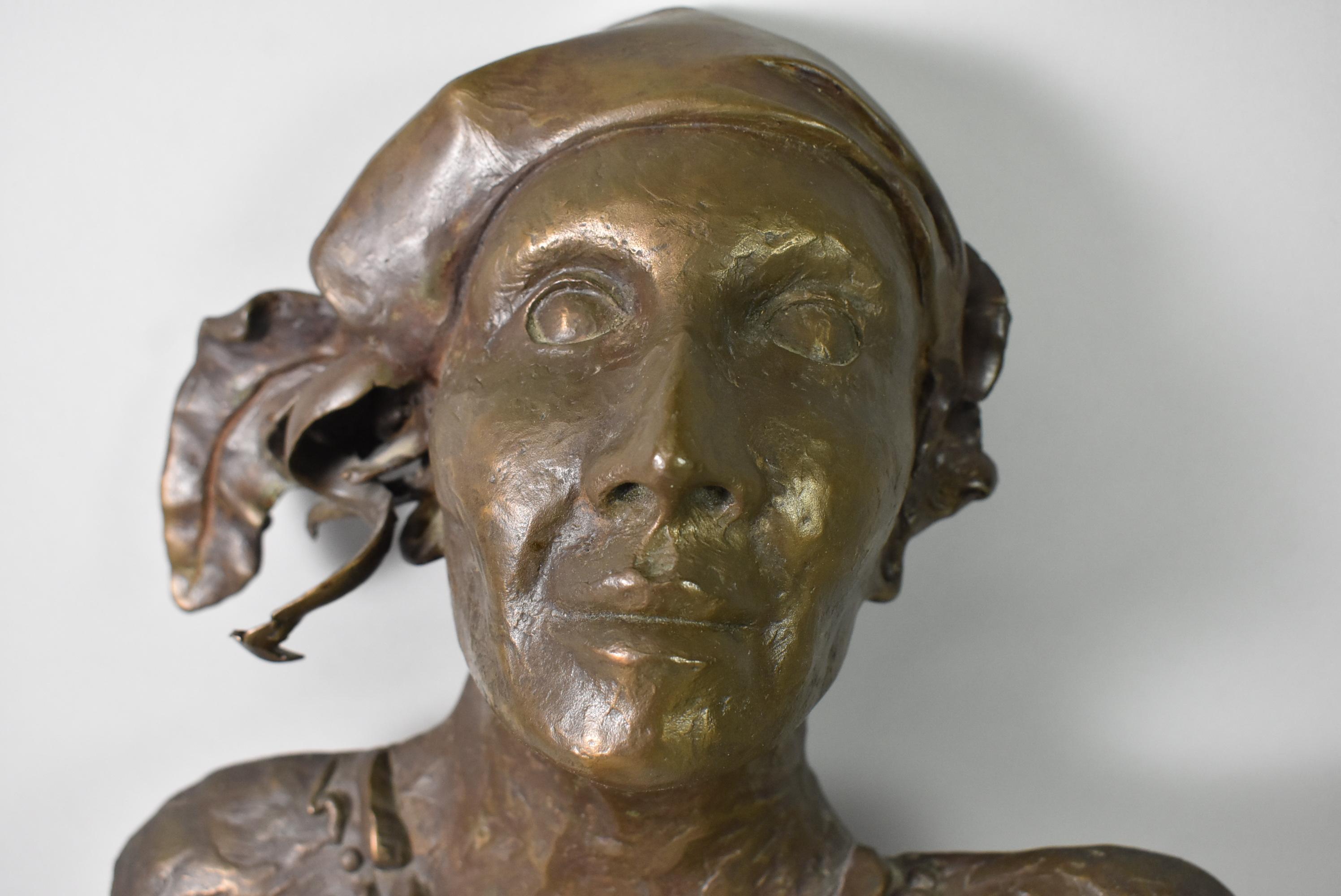 Bronze wall sculpture by Native American artist Darlene Krohn titled 