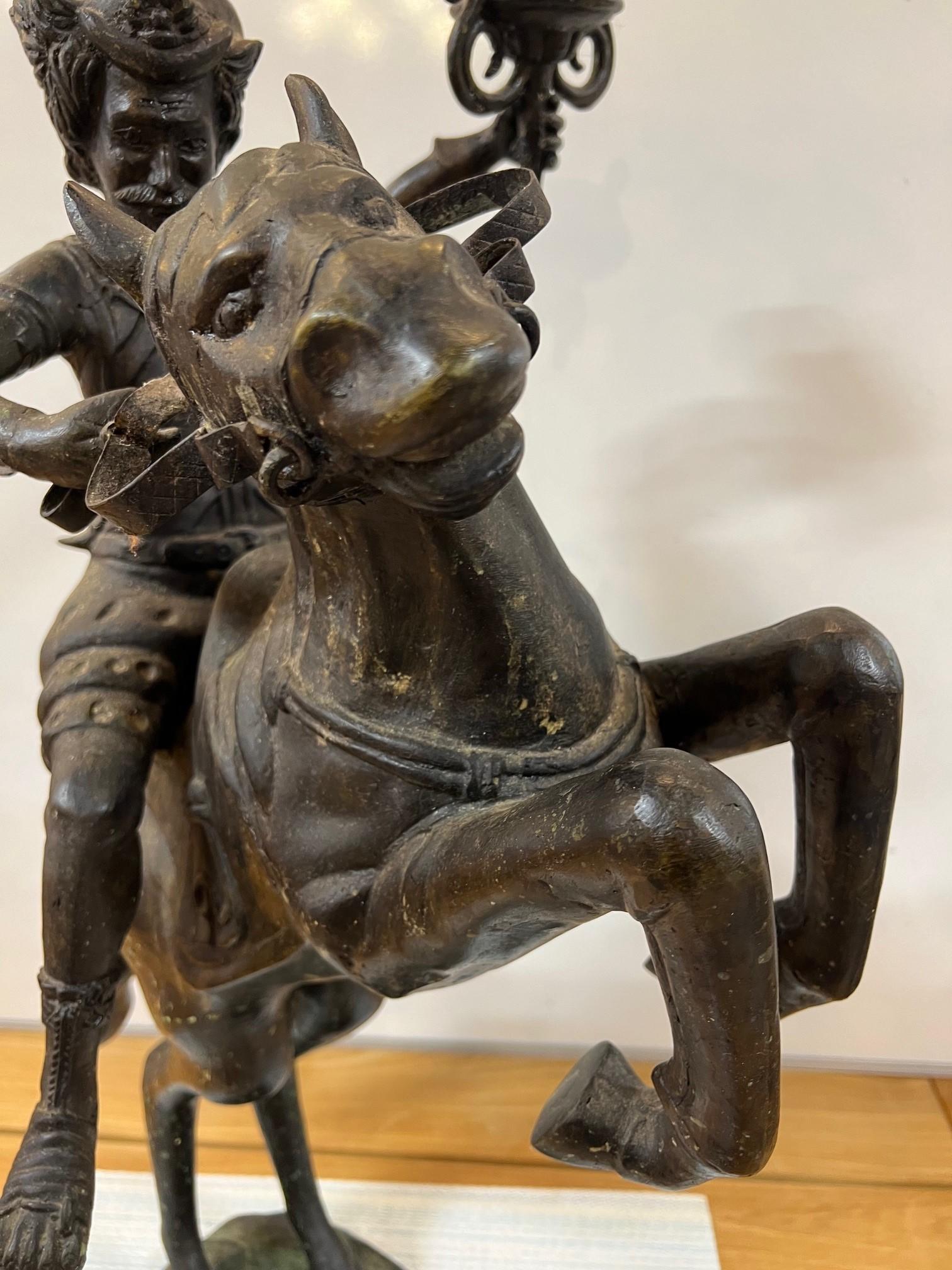 Bronze Warrior or Rider Mounted on a Rearing Horse Holding a Torch Statue In Good Condition For Sale In Stamford, CT