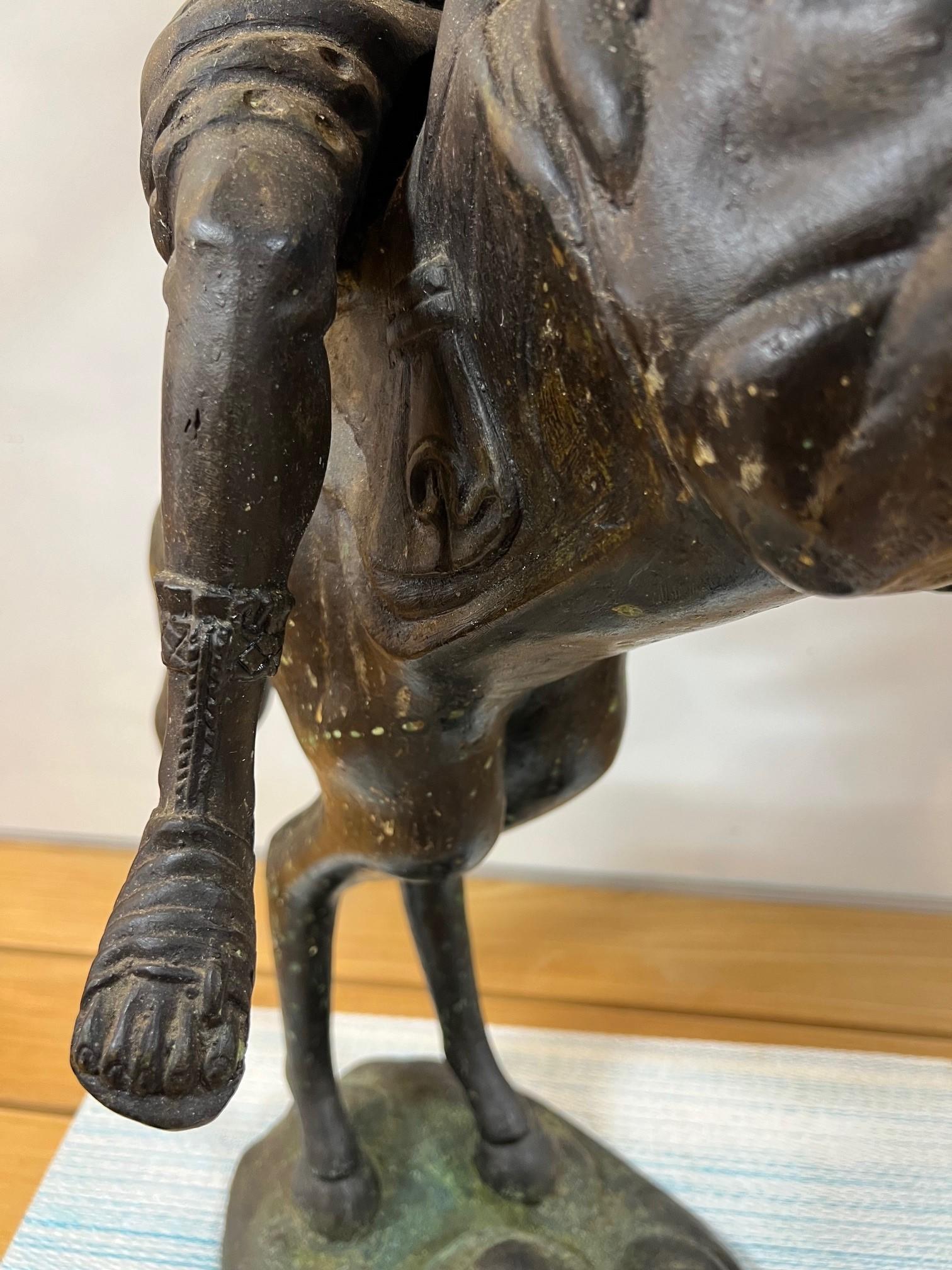 20th Century Bronze Warrior or Rider Mounted on a Rearing Horse Holding a Torch Statue For Sale