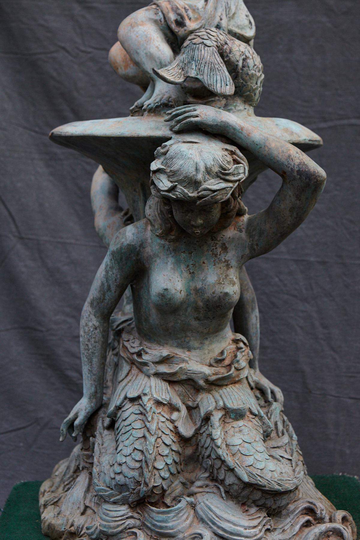 Bronze Water Garden Statue of Merman and Mermaid Carrying a Merboy 2