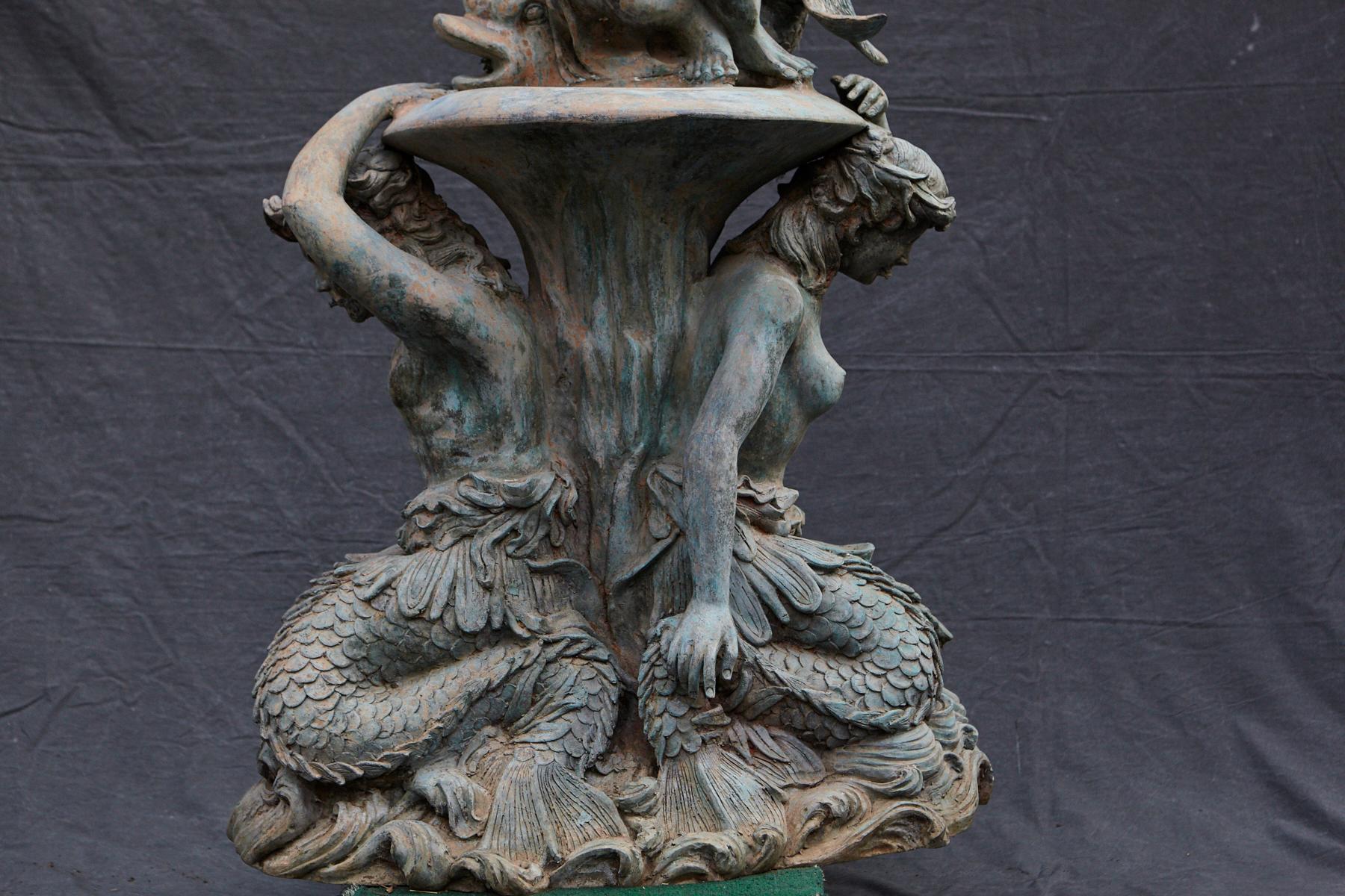 American Bronze Water Garden Statue of Merman and Mermaid Carrying a Merboy