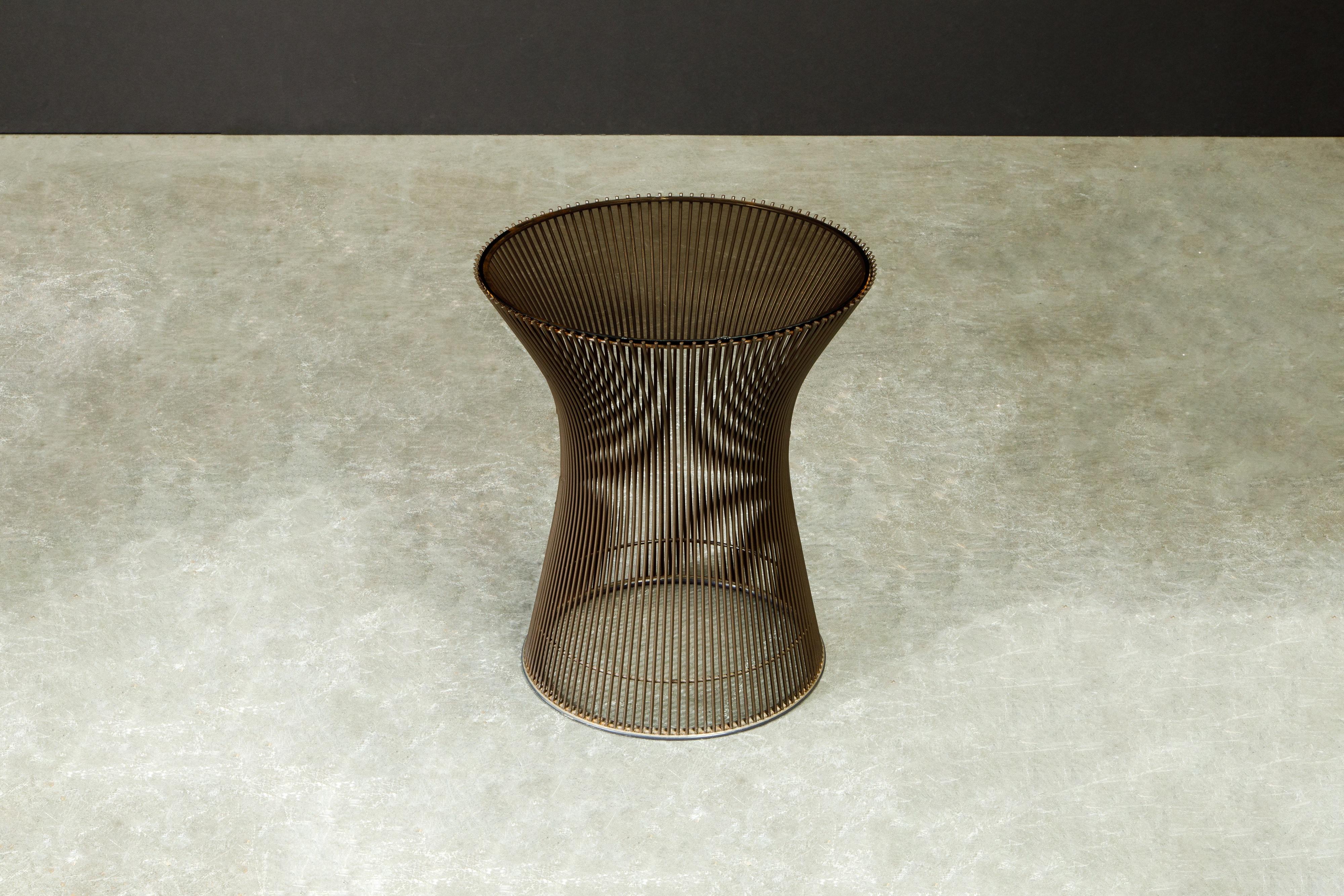 A beautiful original production bronze side table by Warren Platner for Knoll International, designed in 1966 and this example produced during the original production years of this design, circa 1968 to mid 70s. This example is in great vintage