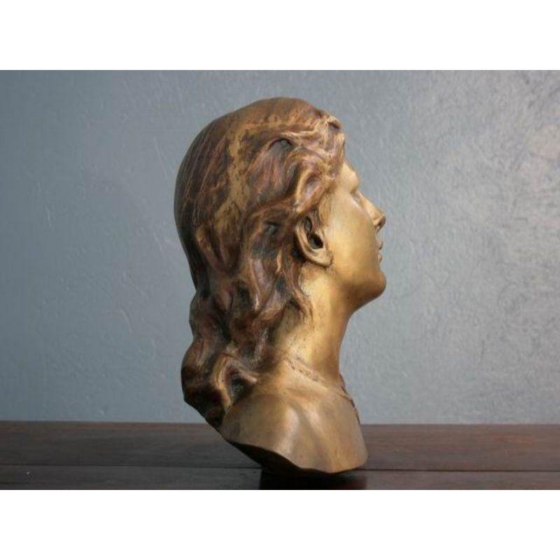 Patinated Bronze Woman's Head with Golden Patina, Early 20th Century For Sale