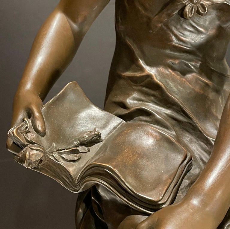 Cast Bronze Young Girl with Book and Rose 