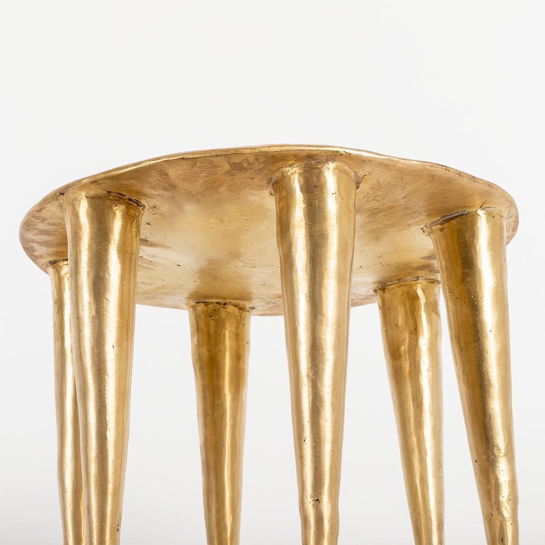 Bronze Sculptural Zindi side table
Design: Charlotte Thon & Marc Boinet
Measures: H 29 cm — Ø 34 cm 
10 kilos
Stool on six feet inspired by royal Nigerian Nupe stools.
The name of this stool comes from the word zindi, which evokes the seat in Moore,