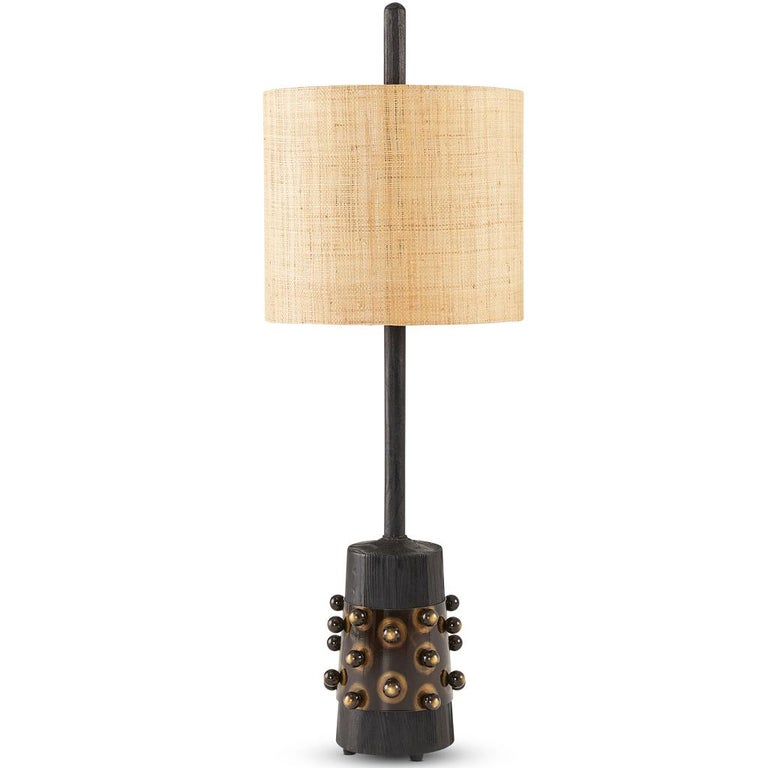The Silhouette lamp collection is inspired by Brutalist forms. The dark Ebonized Oak is combined with bronzed steel components and finished with a raffia shade.
The Silhouette lamps are tall at 107CM which give them a strong sculptural presence in