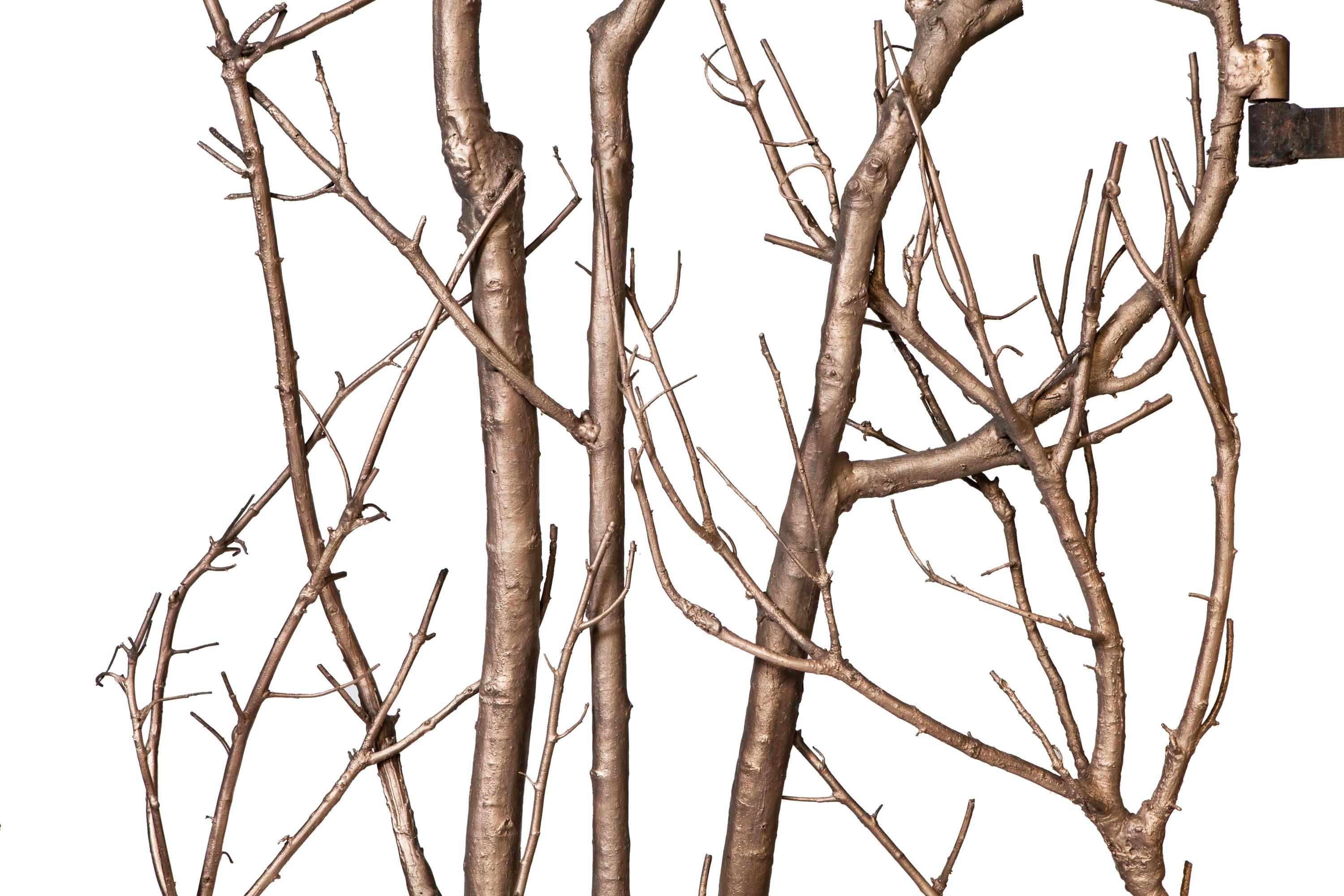 Pair of doors made of wood branches which have been bronzed.