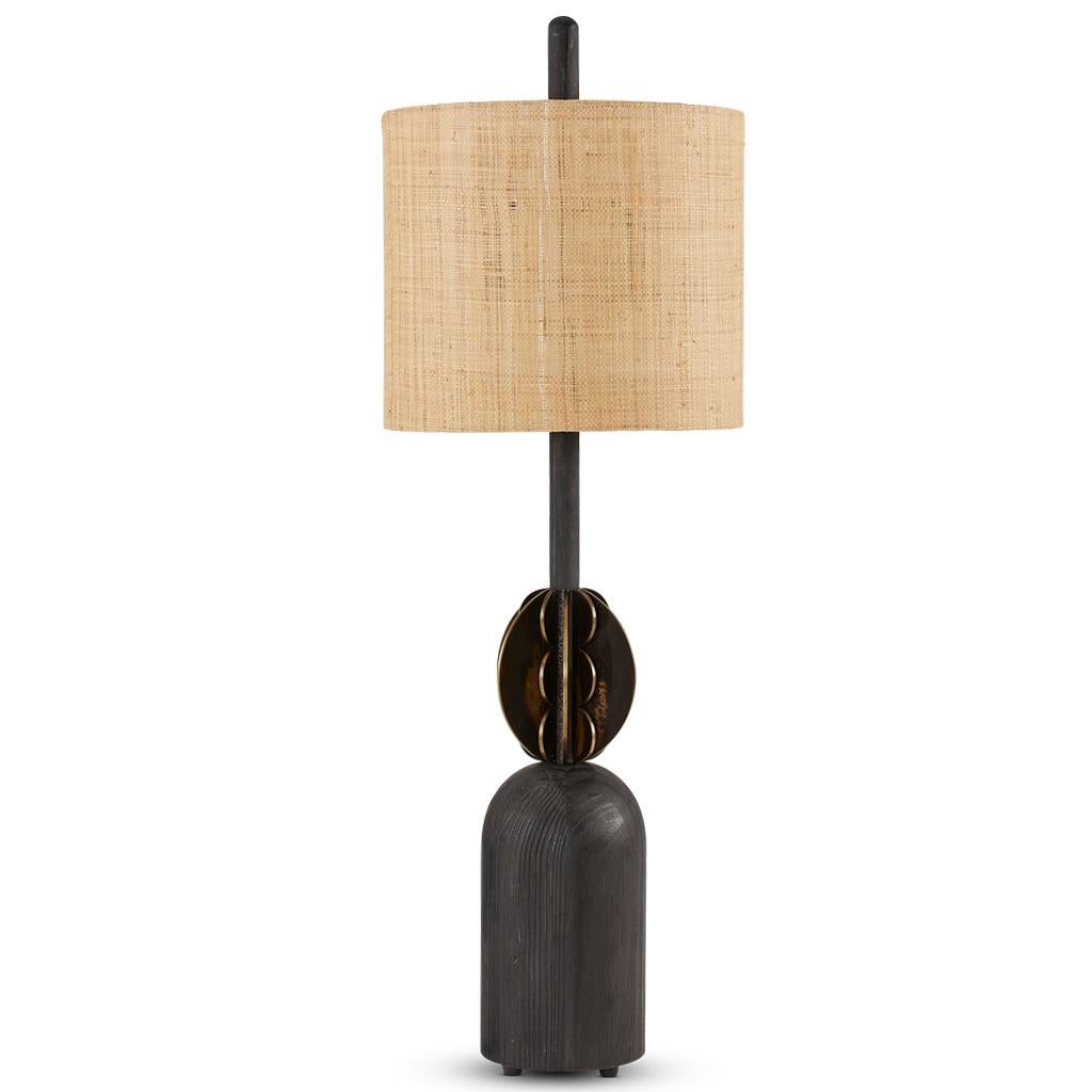 The Silhouette lamp collection is inspired by Brutalist forms. The dark Ebonized Oak is combined with bronzed steel components and finished with a raffia shade.
The Silhouette lamps are tall at 107CM which give them a strong sculptural presence in