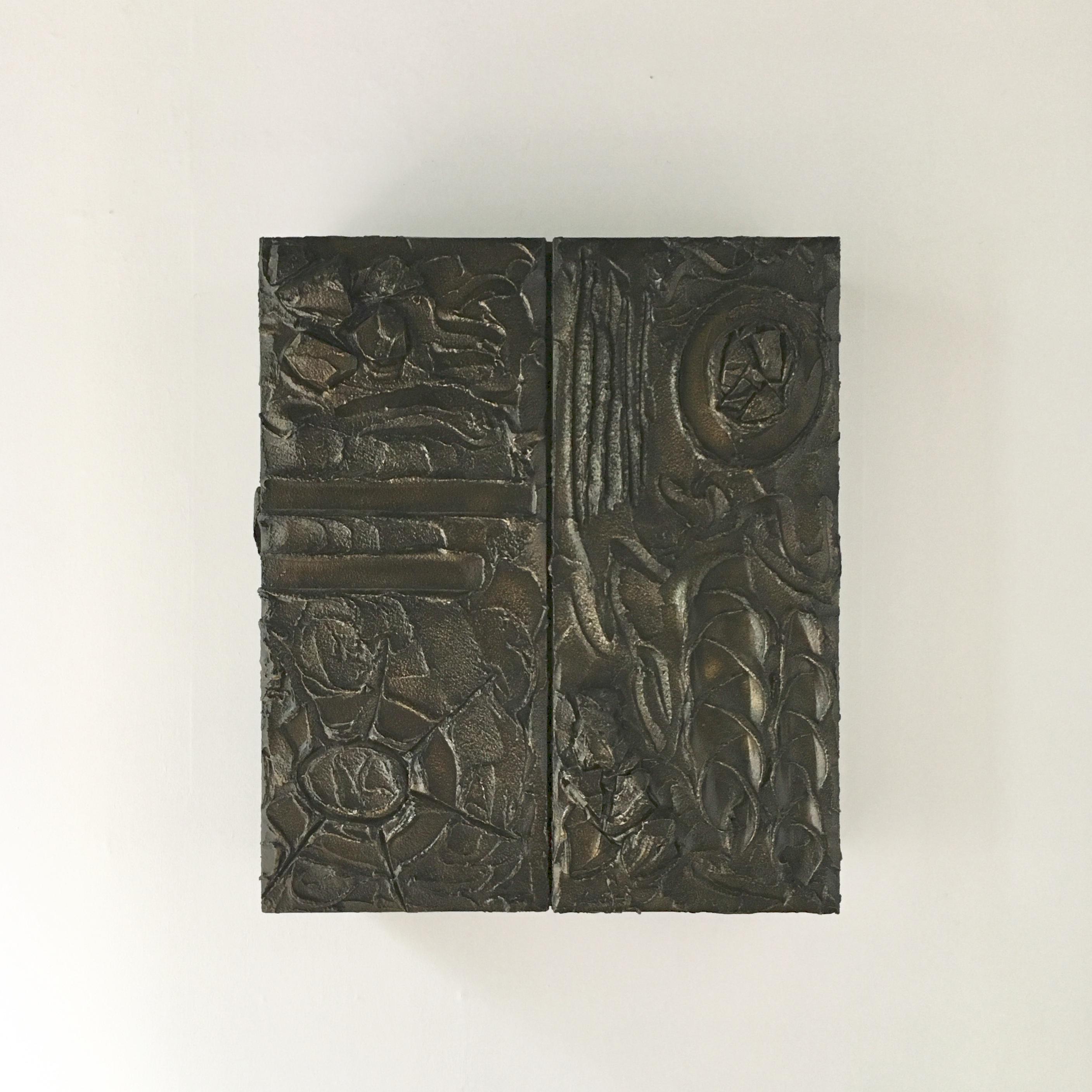Sculpted bronzed resin Paul Evans designed two door wall hung cabinet signed and dated PE70 1970.
Part of his bronze 100 series for directional, wooden carcass with Evans 