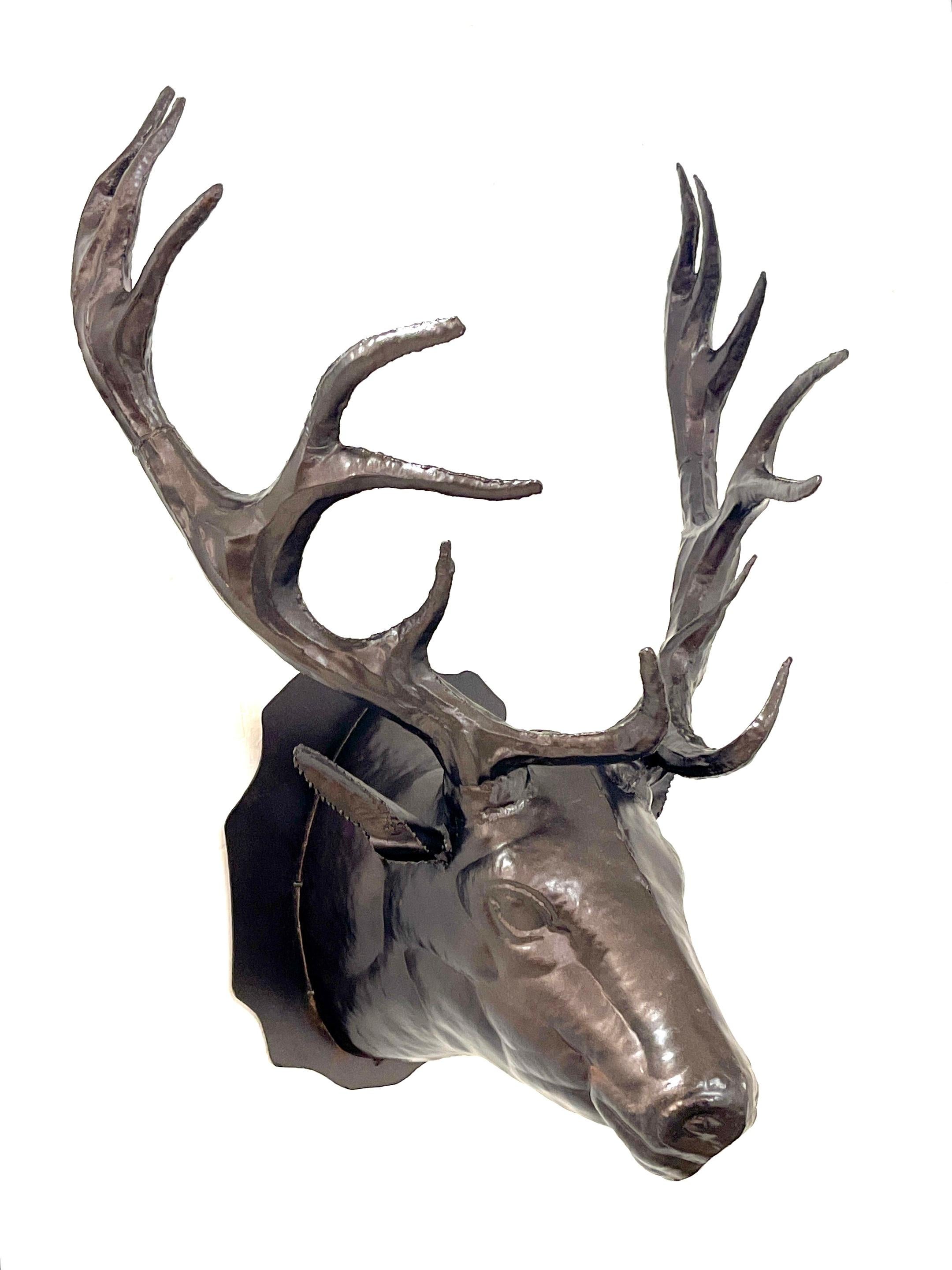 Bronzed Tole 14-point Buck Trophy Head Wall Mount 

A striking Bronzed Tole 14-point Buck Trophy Head Wall Mount, an great vintage sporting art sculpture. This impressive wall sculpture boasts a generous size and scale, capturing the essence of a
