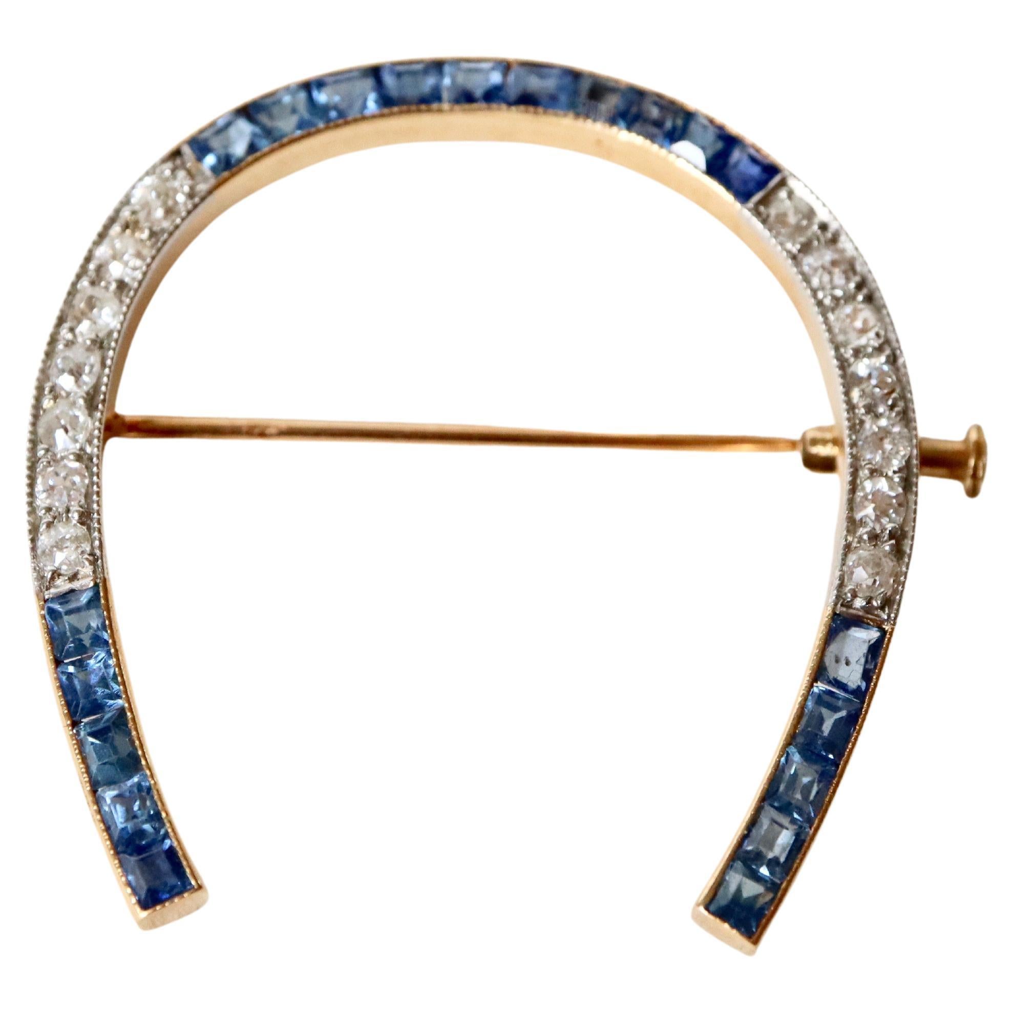 Brooch 18kt Gold Horseshoe with Sapphires and Diamonds 1920 Platinum For Sale