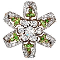 BROOCH-Belle Époque Flower Diamond and Demantoid Garnet in Platinum & 18K Gold.