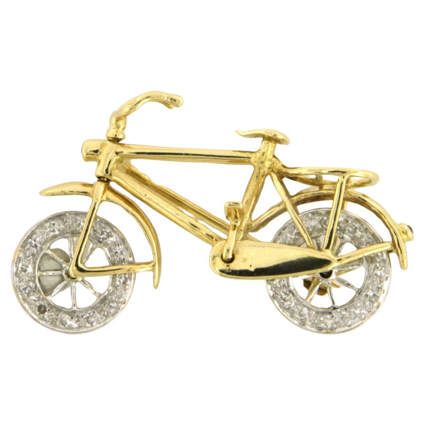 Brooch in a shape of a bicycle with single cut diamond up to 0.24ct 18k gold