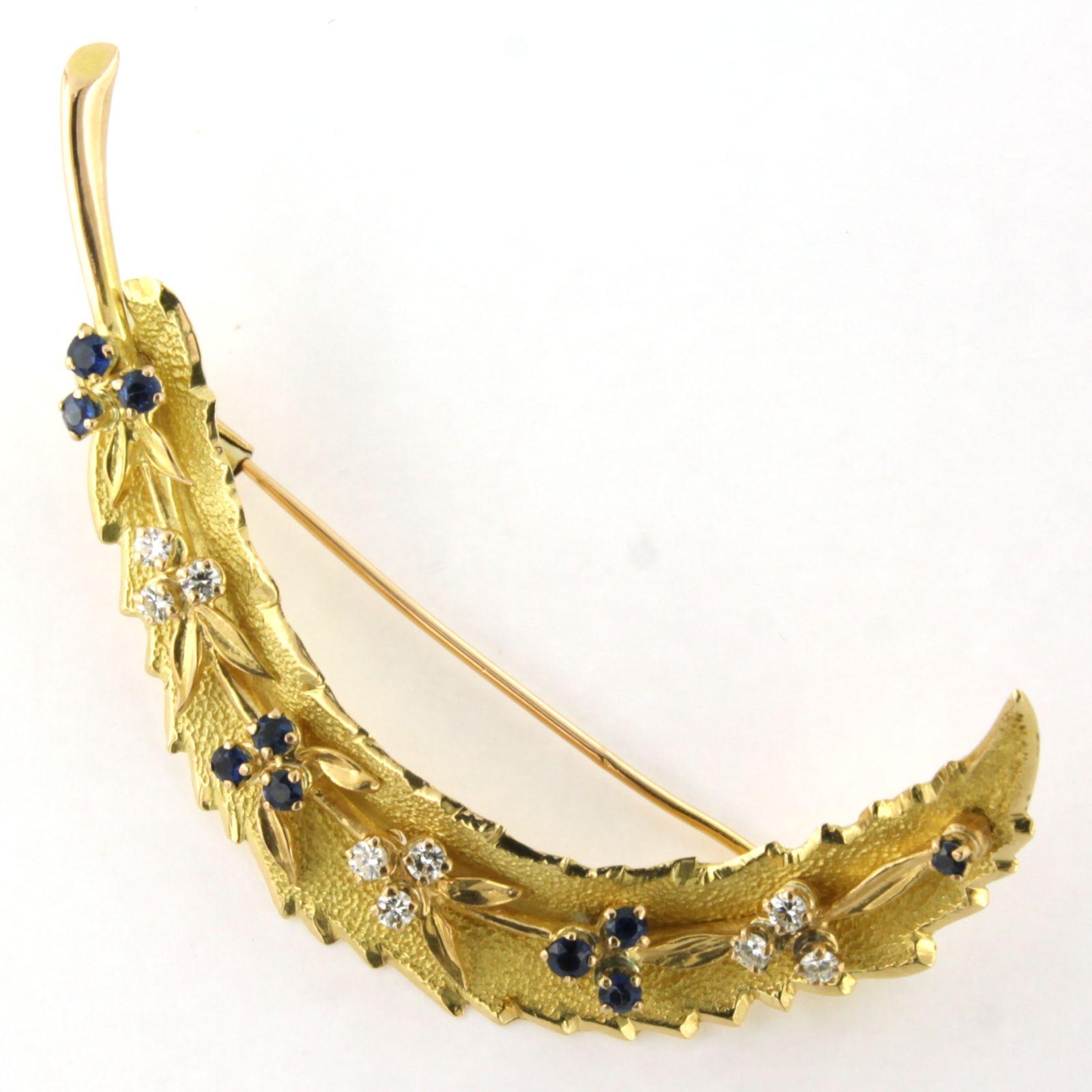 Brooch in a shape of a feather with sapphire and brilliant cut diamonds 18k gold In Excellent Condition For Sale In The Hague, ZH