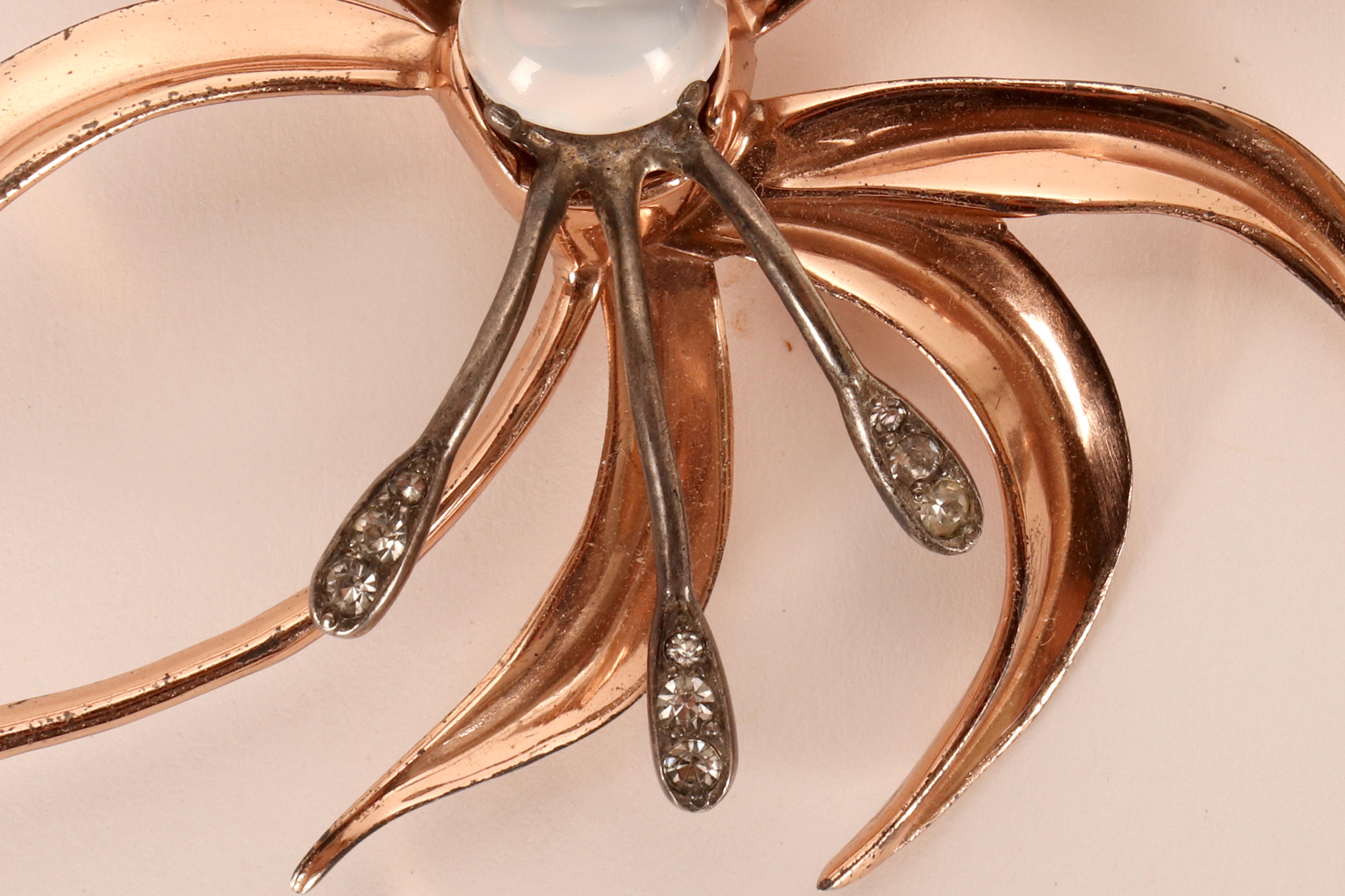 XX secolo Brooch in sterling silver, gold and glass paste by Nettie Rosenstein. USA 1950. in vendita